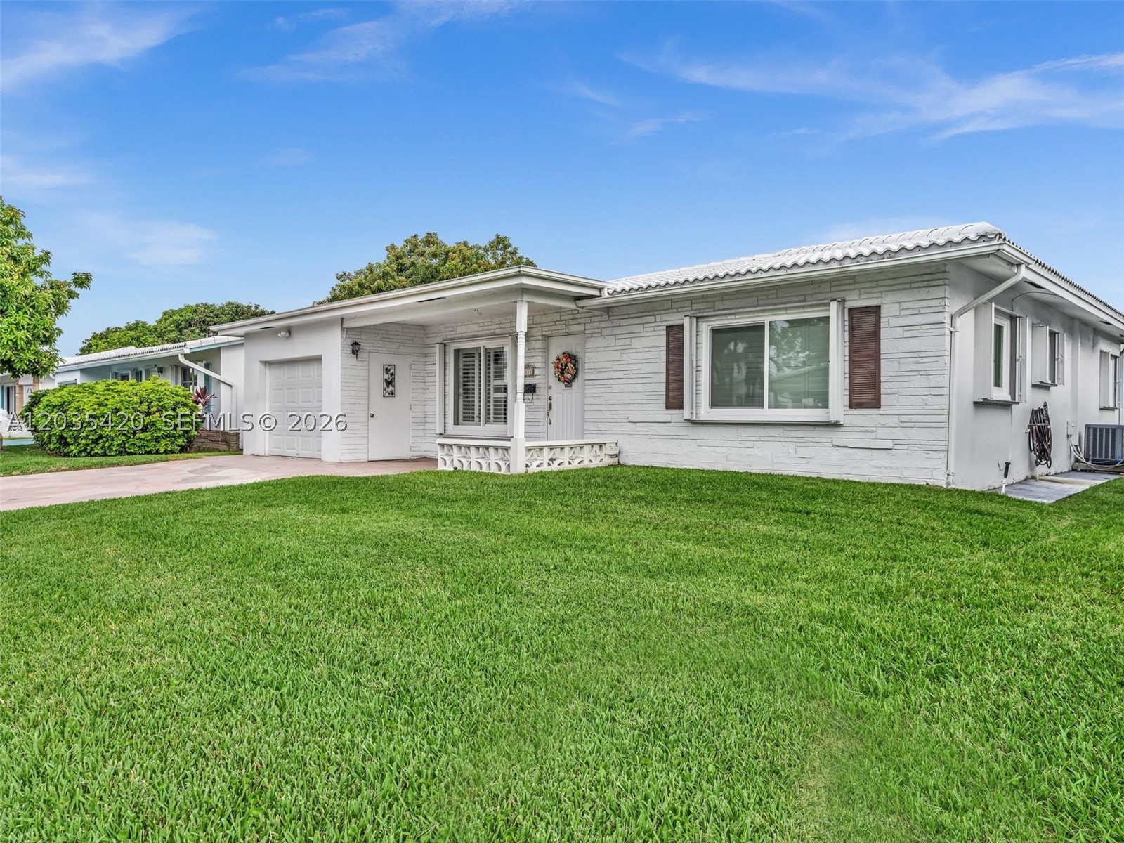 Welcome to this beautifully maintained 2-bedroom, 2-bath single-family residence in the heart of Tamarac. This spacious home features a 1-car garage, an abundance of natural light throughout. The updated kitchen offers granite countertops, ample cabinetry, stainless steel appliances, and a convenient breakfast bar perfect for casual dining and entertaining.
Interior features include elegant crown molding, neutral tile flooring throughout the main living areas, plantation shutters, and generously sized bedrooms. The oversized primary suite provides plenty of space, large mirrored closets, and an en-suite bath.
Enjoy peace of mind with electric roll-down hurricane shutters and a well-maintained exterior. The enclosed Florida room offers additional living space overlooking a lush green backyard area or can roll down shutters for a blackout effect. Residents enjoy access to community amenities including a clubhouse, resort-style pool, billiards, and social gathering spaces.
Conveniently located near shopping, dining, parks, major roadways, and everything Tamarac has to offer. Move-in ready and waiting for its next owner!