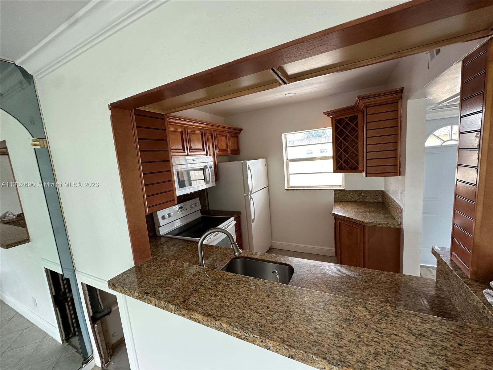 QUINSANA GARDENS CONDO - Residential