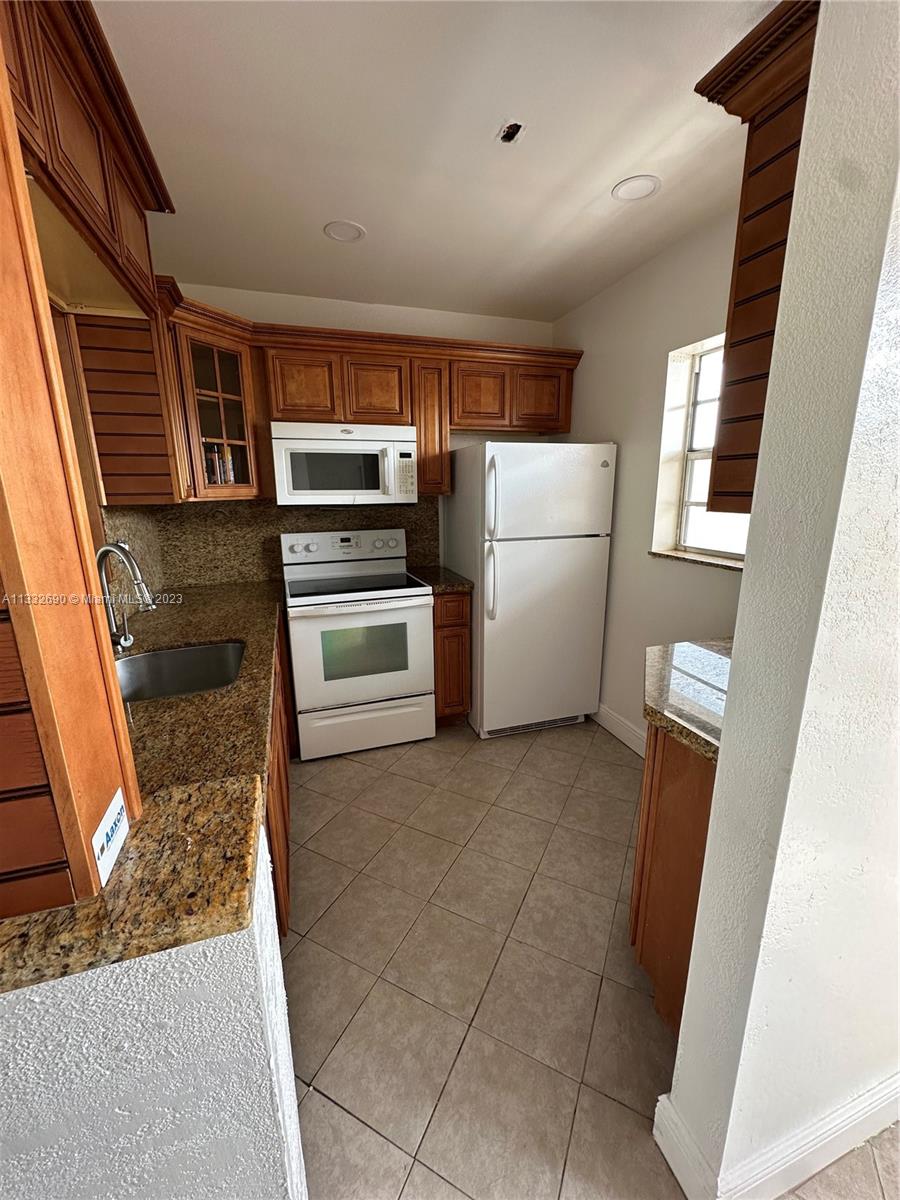 QUINSANA GARDENS CONDO - Residential