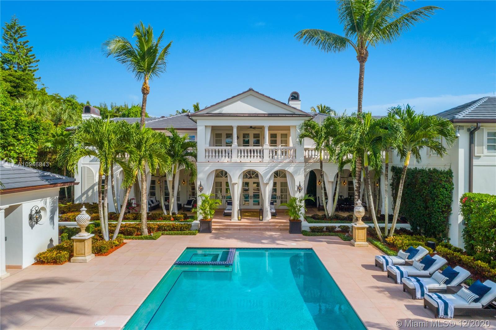 Designer Renovated in 2020 with over half a Million in additions & updates. This gorgeous custom built mansion is nestled behind private gates on 4.1 Acres of land. The home’s layout is ideal for families, complete w/ an abundance of terraces, chef’s kitchen, elevator, game room, 3 car garage, 3 fireplaces, oversized pool w/ spa, outdoor dining with summer kitchen & pool house, & more. From the bespoke interiors to the lavish landscaping & amenities, this home provides the perfect environment for high class entertainment & gracious living. 2019/2020 Additions/Updates: Custom Designer Beach Platform & Pathway to utilize the private beach w/ 325FT of Deeded Beachfront. Concrete Roof w/ 15 yr Warranty. Miele Washer/Dryer. Exterior Lighting/Fans. Custom Elegant Curtains Inside/Outside.