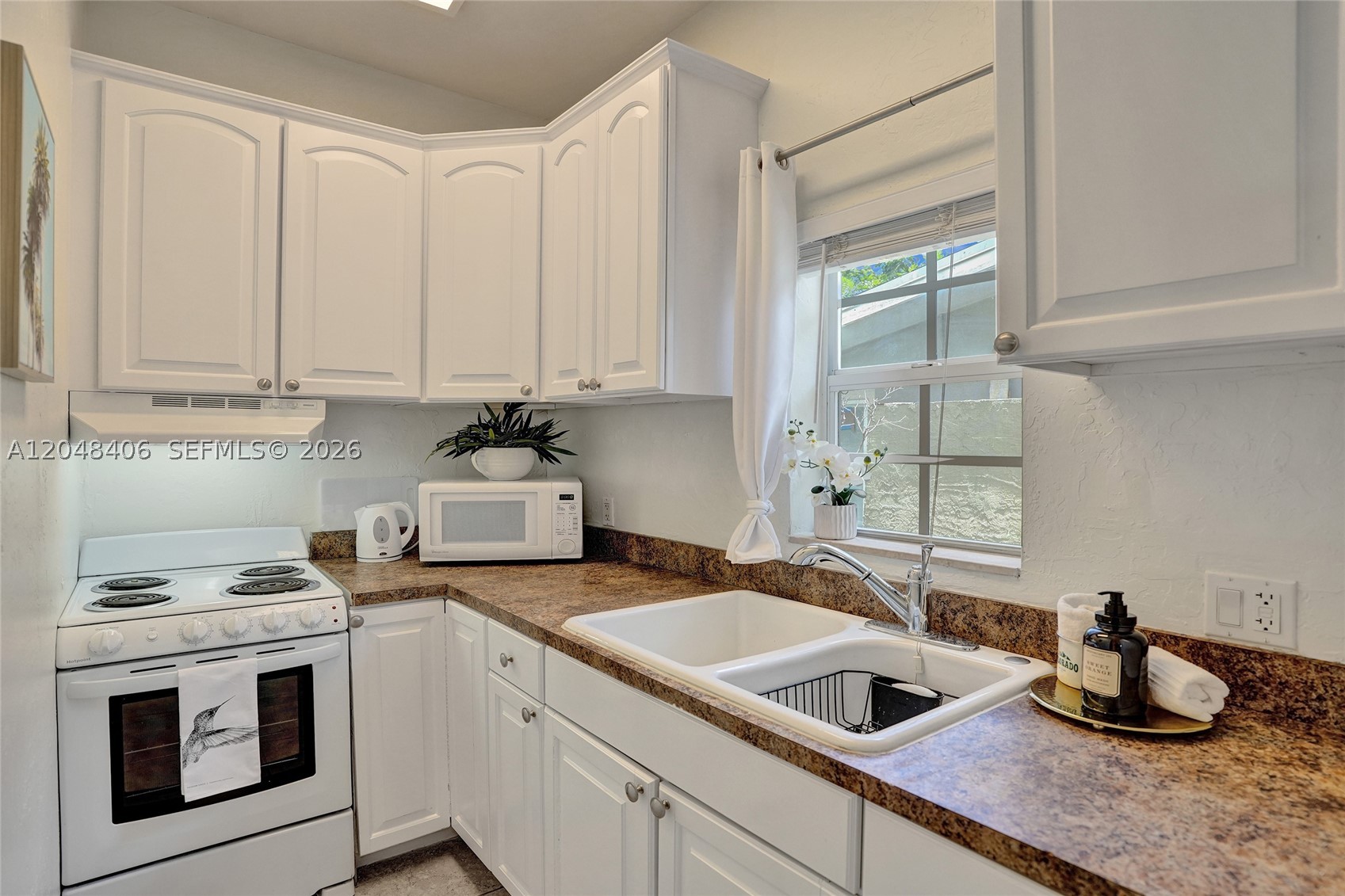 Fort Lauderdale living just steps from Wilton Drive! Clean studio/efficiency with a private in-unit washer and dryer a feature not often found in studios and hurricane-impact windows and doors for added peace of mind. Includes one assigned parking space (no additional resident or guest parking available). Walk to grocery stores, restaurants, nightlife, and entertainment, with the beach, Las Olas, and Downtown Fort Lauderdale just a short drive away. Available August 1. Cats ok.