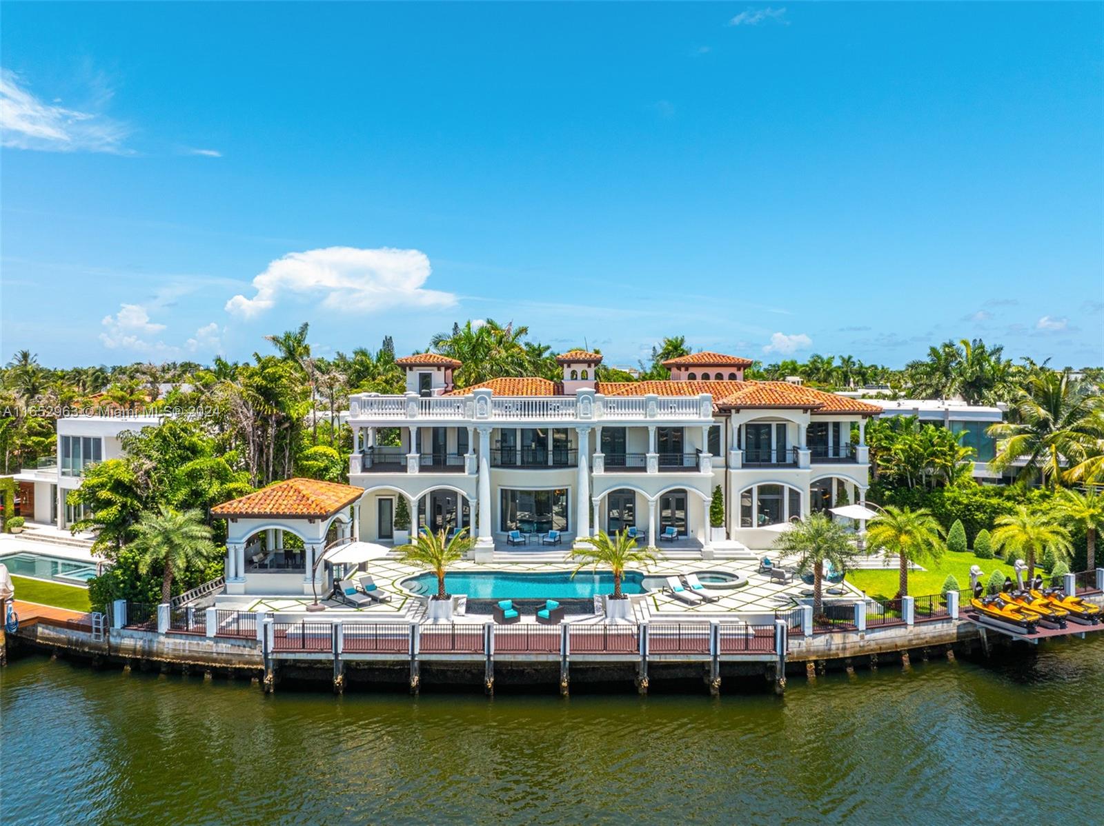 Stunning modern Mediterranean castle in the illustrious Golden Beach, positioned in one of the neighborhood's quiet cul-de-sacs. This legacy estate boasts 200 ft of prime Intracoastal water frontage with rare long water views. The property encompasses nearly 20,000 sq ft, with almost 10,000 sq ft of luxurious living space behind private gates that open to breathtaking curb appeal. Experience unmatched quality with the finest finishes throughout, embodying Italian grandeur and a warm, homely ambiance. Pristine water views are visible from nearly every room, making this home a magnificent creation in one of the best locations. Golden Beach enhances this exclusive lifestyle with a private police department, private beach, parks, and palm-lined sidewalks.