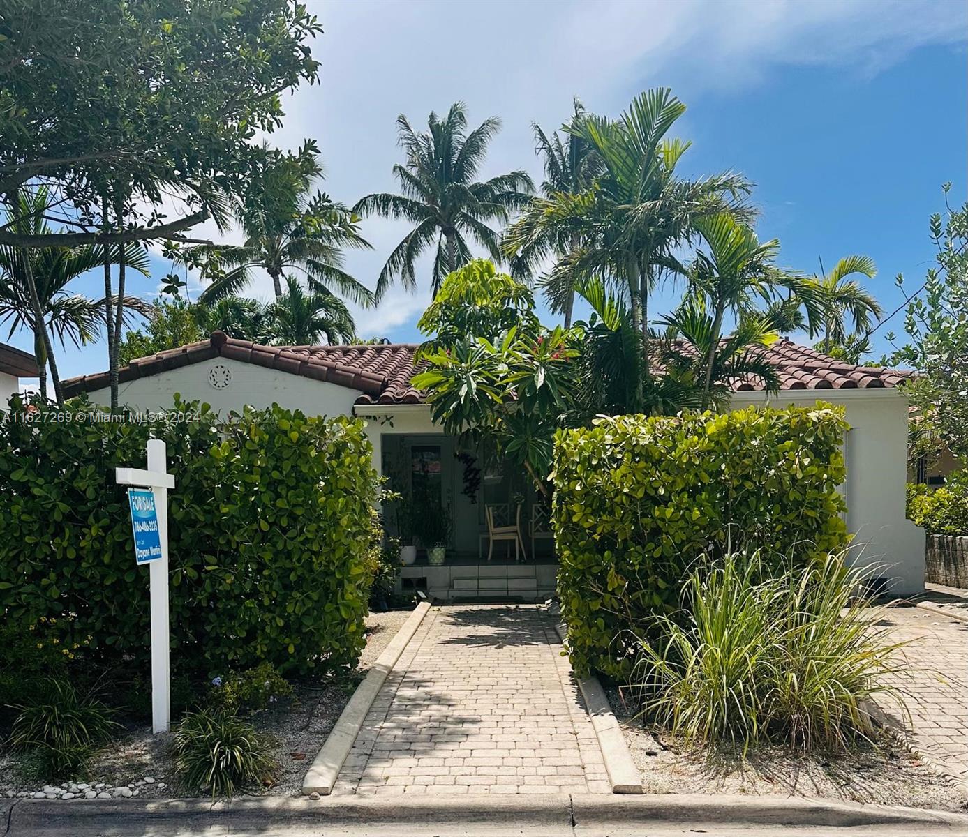 Rare opportunity in Surfside town by the beach. Whether you're looking for a primary home, a vacation getaway, or an investment, this is a great 3-bed, 2-bath home with the potential to convert the garage into a 4th bed. Fenced 5600 sqft lot with composite deck. Perfect for beach lovers, nature enthusiasts, families, and pet owners!

Dark pine wood flooring throughout, classical arched entryways, recessed coffered ceiling design in living/dining rooms, art deco fireplace mantle, and built-in niches. Kitchen updated with stainless steel appliances, gas burner stovetop, and granite countertops. 

Great location, just a 2-block quick walk to the ocean and sand paths. Minutes to Shops at Bal Harbor. Abbott Ave is a very desired street with limited traffic, making it extra safe.