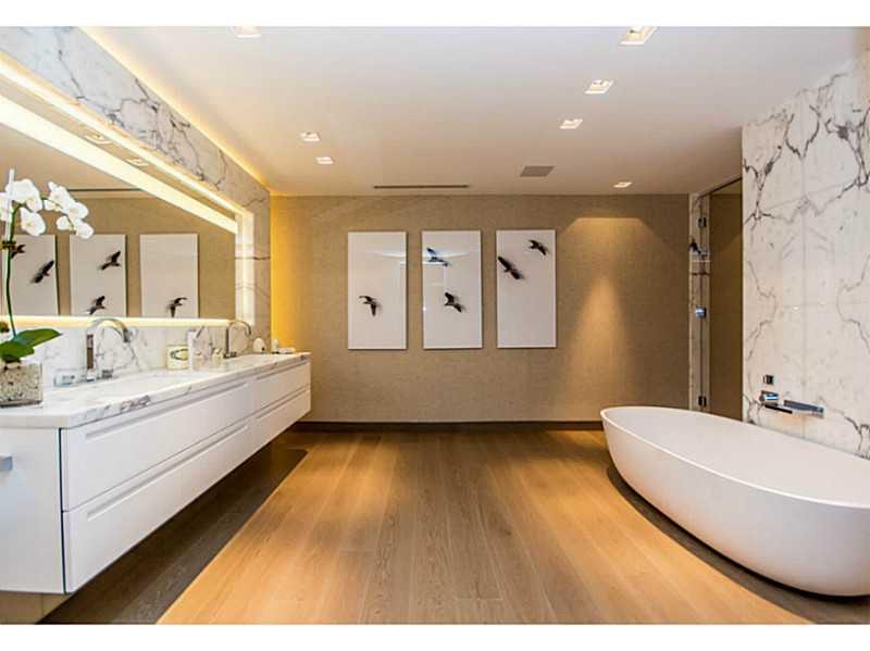 GREAT PRECONSTRUCTION VALUE IN EXCLUSIVE PALAZZO DEL SOL, FISHER ISLAND. Corner flow-thru unit w/expansive Wraparound Terraces & stunning Water and Miami Beach Views. This spacious A East floorplan features private elevator entry, 10' floor to ceiling gla ss, Boffi Kitchens w/ Gaggenau and SubZero appliances, luxurious Boffi Baths w/Book-Matched Statuaria Marble. Lualdi doors. Ultra-lux boutique tower will feature unmatched amenities, Enzo Enea gardens & 6-star white glove services. Completion Jan. 2016.