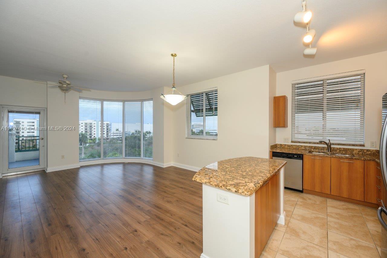 This Penthouse apartment redefines sophistication with its exquisite features.This is upscale living at its finest with water, internet, cable, and (2) assigned parking spaces in the gated garage included. Porcelein Tiled Floors, Granite Countertops, Stainless Steel Kitchen Appliances, European Cabinetry, Marble Shower, and Soaking Bathtub. Enjoy the convenience of Smart Key FOB Entry, Washer and Dryer, and 24-Hour Concierge in the Lobby. The resort-style amenities, from the Tropical Pool and Jacuzzi to the High-Tech Fitness Center and Sauna, elevate your lifestyle. A mere five-minute stroll leads to a picturesque lake, restaurants, supermarket, pharmacy, close to all the main highways and minutes to the Fort Lauderdale International Airport.