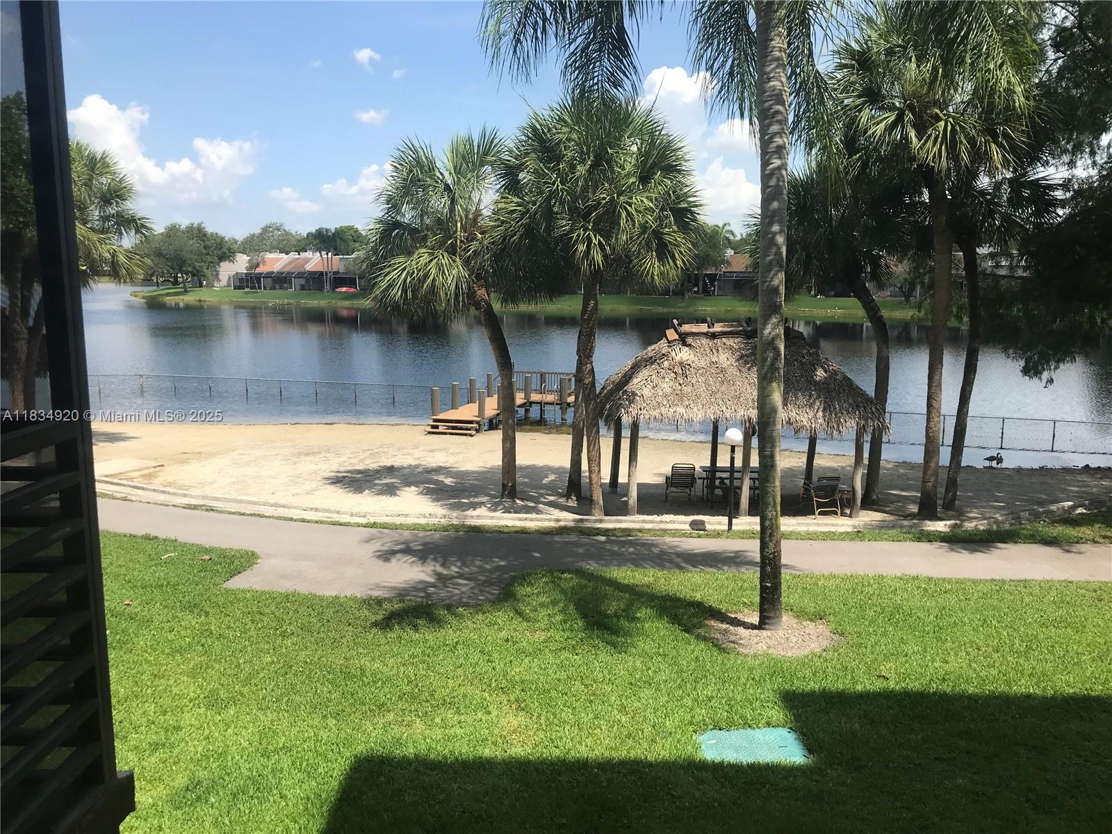 MOTIVATED SELLER Charming 1-bedroom, 1.5-bath condo in a desirable 55+ gated community in Pembroke Pines. This second-floor unit features serene lake views, washer and dryer, hurricane shutters, and elevator access. Enjoy resort-style amenities including a clubhouse, pool, jacuzzi, tennis, racquetball, billiards, and a courtesy bus. HOA includes water, cable, and internet. Association approval required. No leasing allowed. MOTIVATED SELLER—schedule your showing today!