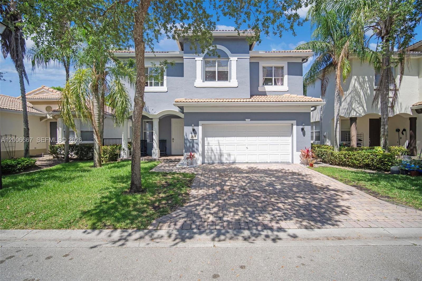 Welcome to luxury and peace of mind in this beautifully updated 5-bedroom, 3.5-bathroom, plus Den residence perfectly situated within one of Riviera Beach’s premier gated communities. Combining modern sophistication with spacious living, this home offers the ideal sanctuary for those seeking a stylish, move-in ready home. A generous main suite featuring a spa-like ensuite bathroom and two large walk-in closets. Updated kitchen with newer appliances, sleek countertops, and ample cabinetry—perfect for entertaining. Close to the pristine beaches of Singer Island and the vibrant amenities of the Palm Beaches. Low association fees.