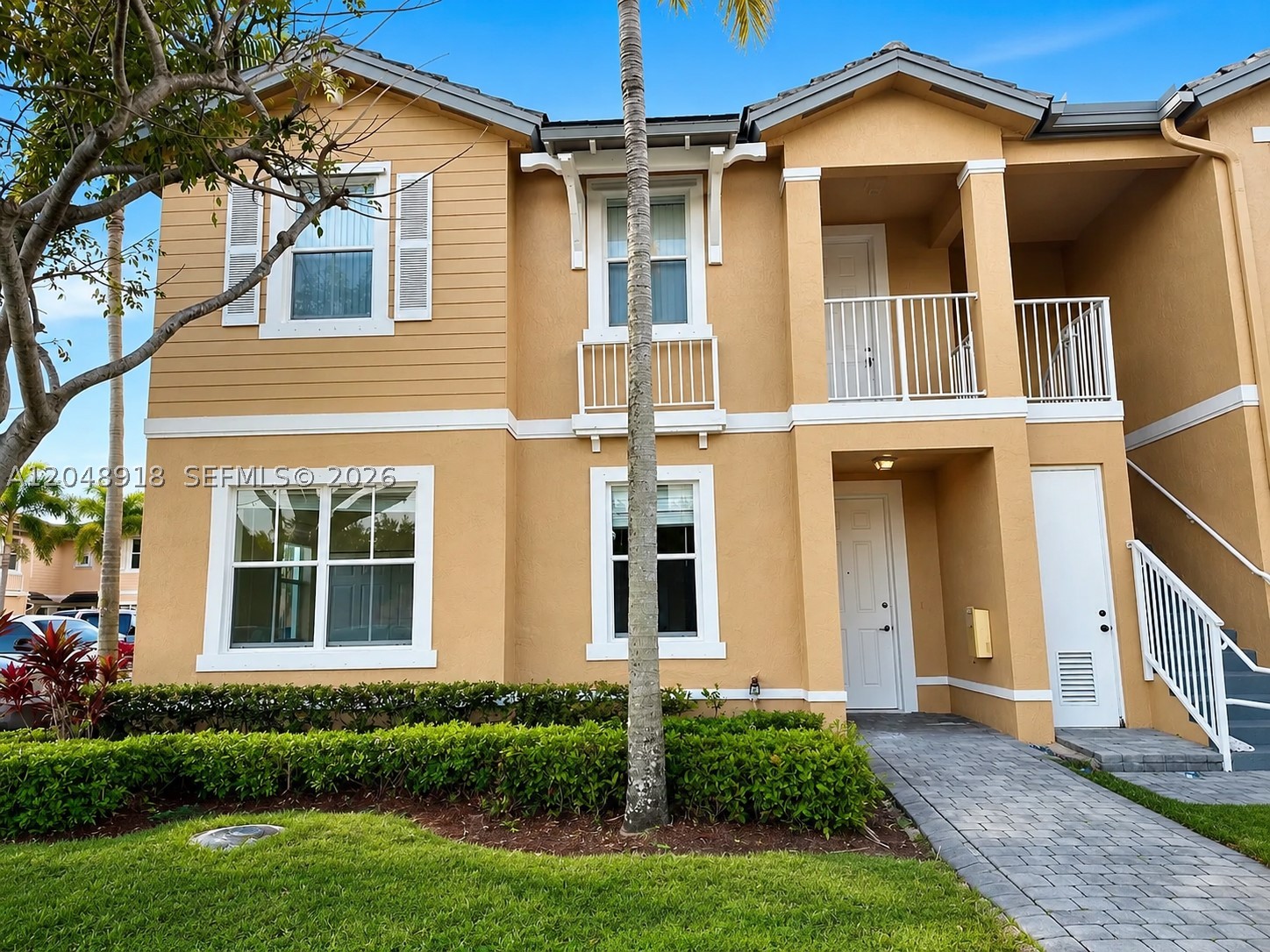 BRIGHT, MODERN & MOVE-IN READY CORNER UNIT IN FIJI! Welcome to this beautifully refreshed 3-bedroom, 2-bath, FIRST FLOOR 1-story townhome-style condo located in the gated community of FIJI Place in HOMESTEAD. This well-maintained corner residence features fresh interior paint, brand-new luxury flooring, some brand-new appliances, abundant natural light, airy vaulted ceilings, and an open-concept layout that feels spacious, modern, and inviting.    The split-bedroom floor plan offers excellent privacy and functionality, while the two-story design provides the added comfort of having no one above you. Enjoy a peaceful lake backdrop from your private balcony, perfect for morning coffee, evening relaxation, or simply taking in the serene Florida setting. just steps from the community pool AND MANY MORE AMENITIES add even more comfort.    FIJI offers a fantastic lifestyle with gated access, resort-style community amenities, and an unbeatable location close to shopping, dining, entertainment, parks, golf, medical facilities, and major roadways. Enjoy the best of SOUTH FLORIDA with easy access to Beaches, THE FLORIDA KEYS, beautiful farmlands, the everglades and all south florida has to offer. Only about minutes to the beaches and approximately 30 minutes to Miami , this home is ideal as a primary residence, seasonal retreat, or investment opportunity. Move-in ready, stylish, and perfectly located—schedule your private showing today before this beautiful Homestead area home is gone!