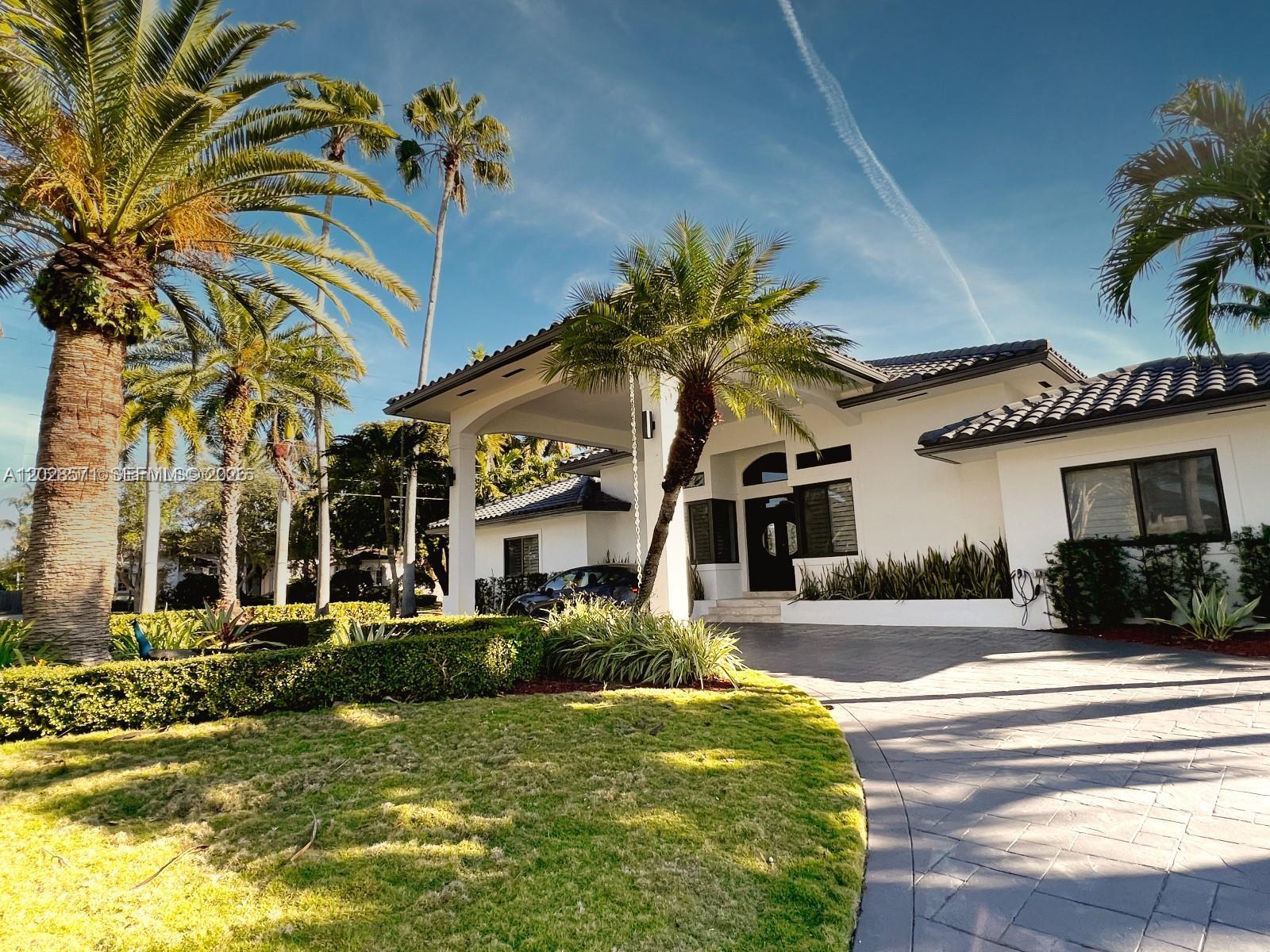 ** SHOWINGS STARTING ON AUGUST 1st, 2026** Available videos upon request. Please submit, Proof of Funds, proof of employment, credit report, background check, renter application. 2 months of rent & 1 security deps. are required to rent house. Renter's Insurance required. Limit of 1 pet.  Beautiful 4 Bedroom / 4 Bathroom open floor plan house. Corner lot home, backs up to Palmer Trinity. Excellent for entertaining with a chef's kitchen including all high end appliances: Dacor Gas Stove, Double Oven, Miele Coffee Machine and a 13ft Island. Marble Floors and wooden (bedrooms) Plantation shutters and electric Shades. Back Glass doors open entirely to the sides (4 panels open to the left and 4 panels open to the right) allowing for an indoor outdoor living experience. Updated and Modern bathrooms. Tons of green and a beautiful pool area. Hurricane Impact windows through out the house. Swat Mosquito System is available for a fee. Rent includes Pool Maintenance, Landscaping and Exterminator.