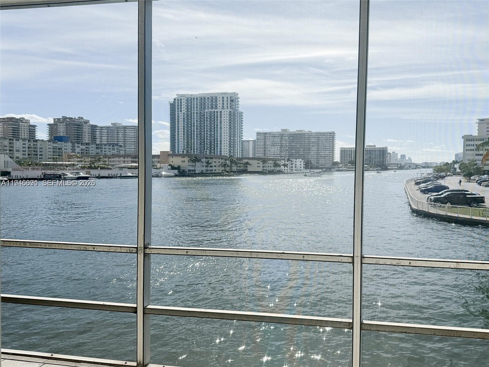 Spectacular Intracoastal and canal views from every room! Gated community. Open kitchen with stainless steelappliances and 24” tile throughout. Enjoy watching the endless boat parade from the unit or screened-in balcony.NEW AC. Tucked away from road noise, offering a peaceful, waterfront lifestyle. 40-year certification complete. Co-op owns the land. Dockage for boats up to 44' through the Association (waitlist). Walk to the beach, shopping, anddining. Conveniently close to Aventura, golf courses, water park, casinos, Hollywood Boardwalk, marinas,Brightline station, and Ft. Lauderdale Airport. Fantastic location!