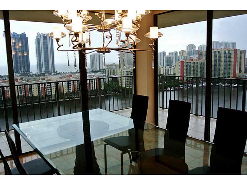 ENJOY BREATHTAKING OCEAN AND INTRACOASTAL VIEWS FROM EVERY ROOM AND FROM THE OVERSIZED WRAPAROUND BALCONY! This remodeled and mostly furnished condo has a spacious layout allowing for lots of privacy. It has plenty of built in closets with W/D inside the  unit. The condominium was recently renovated, and it offers all imaginable amenities, such as pool, tennis court, gym, bike storage, billiard and meeting rooms. The building is just a short stroll away from the beach.