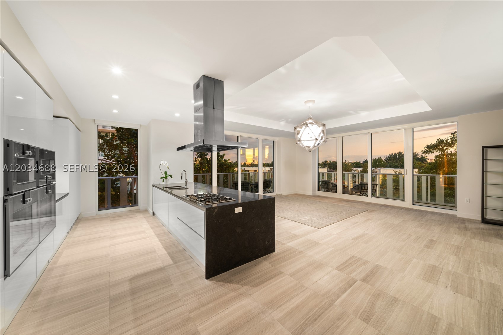 Experience expansive sunset views from Residence 315, a corner unit with floor to ceiling windows overlooking the property’s Meditation Garden. This 2 bed/2.5 bath home totals over 2,309 SF of indoor-outdoor living and soaring ceilings in the primary suite & great room. Gaggenau appliances outfit the kitchen with a gas range, sleek gloss European cabinets, waterfall island & Zucchetti fixtures throughout. Generous custom closets are featured in both bedroom wardrobes. On-site amenities include attentive concierge, art studio, theater, virtual golf simulator, toddler room,  gym, spa, yoga studio, sauna, steam, cold plunge,  in-house bicycles and a residential clubhouse. The rooftop is a world of its own featuring a half-acre pool deck, resort-style restaurant and bar to enjoy the sunsets overlooking the panoramic views of the Miami & Miami Beach skylines. Discover the unparalleled lifestyle offered at The Ritz-Carlton Residences of Miami Beach.