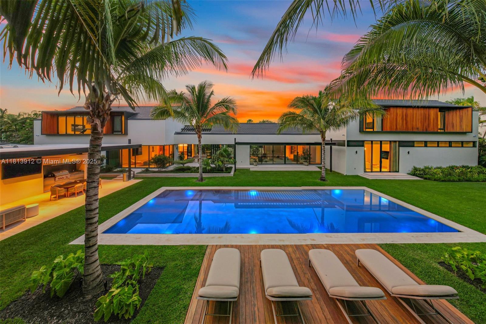 One-of-a-kind contemporary masterpiece in prestigious Ponce-Davis, designed by world-renowned SAOTA architects. This 9,000+ SF home blends bold modern design with natural elegance across a 37,897 SF lot. Featuring 5 spacious bedrooms, 5 full and 2 half baths, a home office, and a large gym convertible to additional rooms. Floor-to-ceiling glass, natural wood, and refined architectural details create a serene, open atmosphere. The chef’s kitchen connects to expansive living/dining areas, while the luxurious primary suite overlooks lush, private landscaping and opens to outdoor lounges. Outdoors, enjoy a resort-style setting with a summer kitchen, elegant pool, and beautifully designed spaces for entertaining. Ideally located near top-rated schools and Miami’s finest dining.