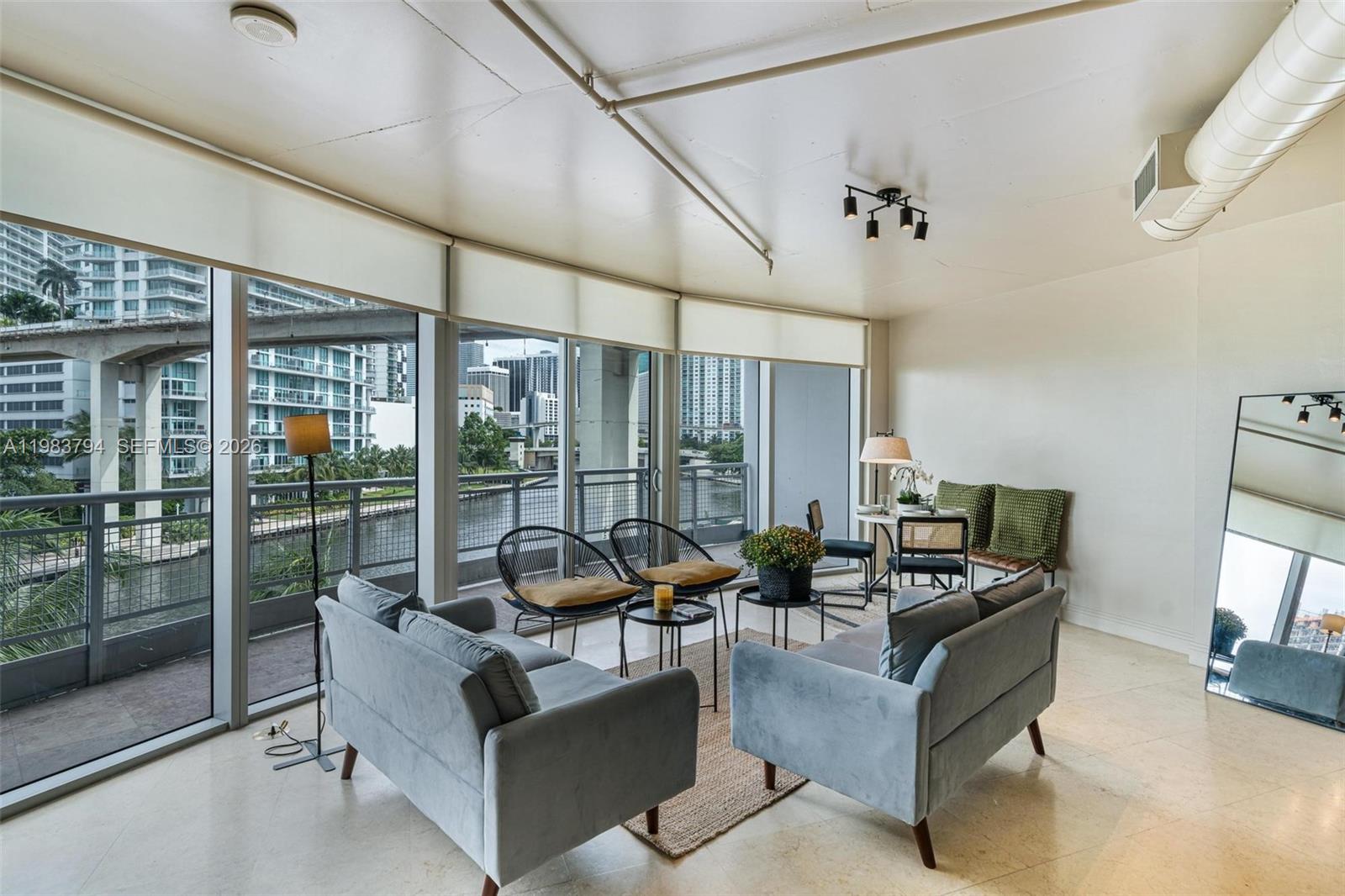 Welcome to "The Snob" — your dream studio in the heart of Brickell. With 727 sq ft, this beautifully appointed retreat offers the perfect blend of style and comfort for the discerning urbanite.
The open floor plan creates a seamless flow for easy living and entertaining. Large impact windows flood the space with natural light, framing stunning views of the Miami River with the peace of mind of impact glass.
Nestled in the heart of Brickell, you're within walking distance of world-class dining, shopping, and cultural attractions. Resort-style amenities include: infinity-edge pool, hot tub, poolside cabanas, rooftop lounge, state-of-the-art gym, CrossFit & boxing area, racquetball, basketball & pickleball courts, sauna, steam room, dojo, clubroom with billiards, cigar/library room, business center, dog park, and on-site dining at American Social — plus 24-hour concierge and valet parking.
One of this unit's standout advantages is its assigned parking space located on the same floor, just steps from the unit — a rare and practical luxury. Skip the elevator entirely on grocery runs and daily errands, making everyday living effortlessly convenient. For appointments please use showing assist.