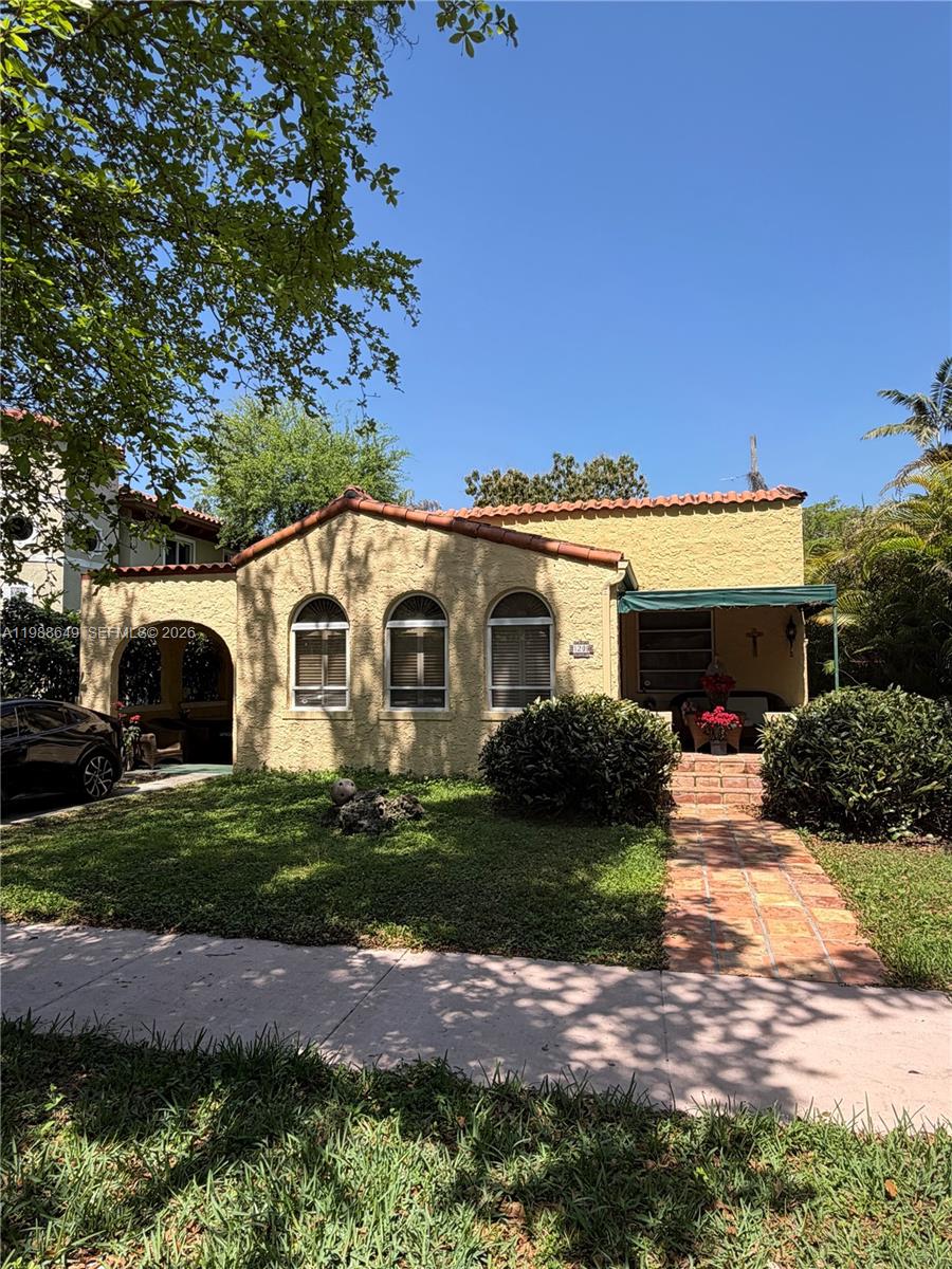 1209 Mariana Ave presents a rare opportunity to restore and reimagine a character-rich residence in the heart of Coral Gables. Set on a picturesque, tree-lined street, this 1,531 SF home features soaring ceilings, generously proportioned bedrooms, and a flowing layout designed for both everyday living and entertaining. The primary suite includes an expansive den or office with the potential to create a refined, spa-like bath, while the detached garage lends itself to a private casita or guest residence. With timeless architectural details and undeniable charm, this is an exceptional canvas for a discerning buyer seeking to craft a bespoke home. Owner open to seller financing. Contact listing agent for interior photos and additional information.
