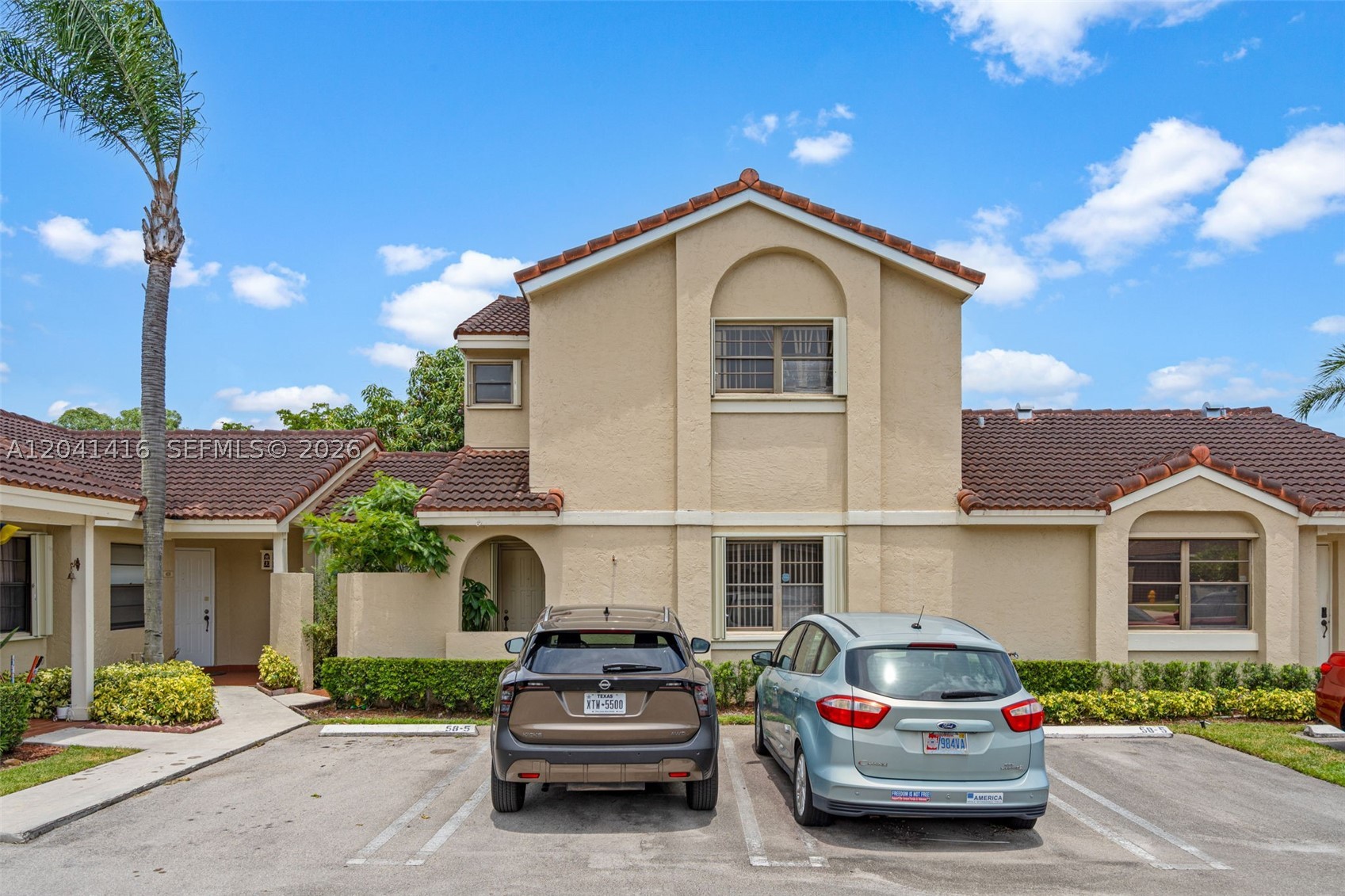 Townhouse located at The Moors Village Homes featuring 2 bedrooms plus den and 2 bathrooms. The home includes a private patio with additional storage space and two assigned parking spaces. Property needs TLC, offering a great opportunity for renovation and personal customization. Situated in a highly sought-after gated community steps from Miami Lakes. The Moors offers a true country club lifestyle with two 24/7 guard-gated entrances, roving security, and an impressive array of amenities including a clubhouse with tennis courts, racquetball courts, basketball courts, a tot lot, swimming pool, fitness center, sauna, and a fishing dock, with non-motorized boating permitted on the community lakes. Ideally located just minutes from major highways including the 826, I-75, I-95, and the Turnpike, residents enjoy both convenience and accessibility while still benefiting from the privacy and seclusion of a limited-access gated community.