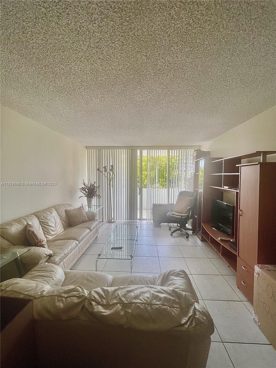 Spacious bright 2bd/1bath unit minutes from Brickell, Roads and Coconut Grove.   Ample dining - living with open passthrough kitchen.  Balcony over looks Coral Way.  Large master with walk-in and additional closet.  Second bedroom is a great space for office, guest or child's room.  Secure and very well maintained building with on site management.  One assigned parking space and ample guest parking is available.  Gardens, pool and BBQ picnic area are steps away from the unit.  Restaurants, Banks and Shopping are within a short walk. Don't miss this opportunity!  Unit is ready for someone to make this a home.