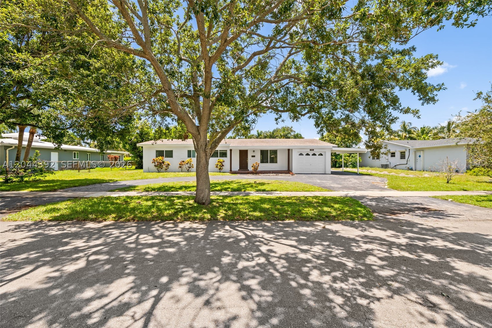 Welcome to this spacious 4 bedroom, 2 bathroom home in the highly desirable Hollywood Hills neighborhood! Offering 1,935 SqFt under air, this well designed residence features an open floor plan that creates a seamless flow between the living, dining & kitchen areas, making it ideal for both everyday living & entertaining.

Major updates provide peace of mind, including a 2018 roof & almost all windows & doors upgraded to hurricane impact. Additional features include a 1 car garage, dedicated utility room, circular driveway with ample parking & an expansive 11,727 SqFt lot with a large backyard offering plenty of room for a pool, outdoor entertaining & boat/RV parking. Best of all, there is no HOA.

Perfectly positioned in the heart of South Florida, this home is less than 15 mins from Hollywood Beach & Fort Lauderdale Hollywood International Airport, offers convenient access to both I-95/Turnpike & is ideally situated between Ft Lauderdale & Miami for an easy commute. You'll also appreciate the close proximity to houses of worship, parks, highly rated schools, shopping, dining & everyday conveniences.

A rare opportunity to own a spacious home on an oversized lot in one of Hollywood's most established & sought after neighborhoods.