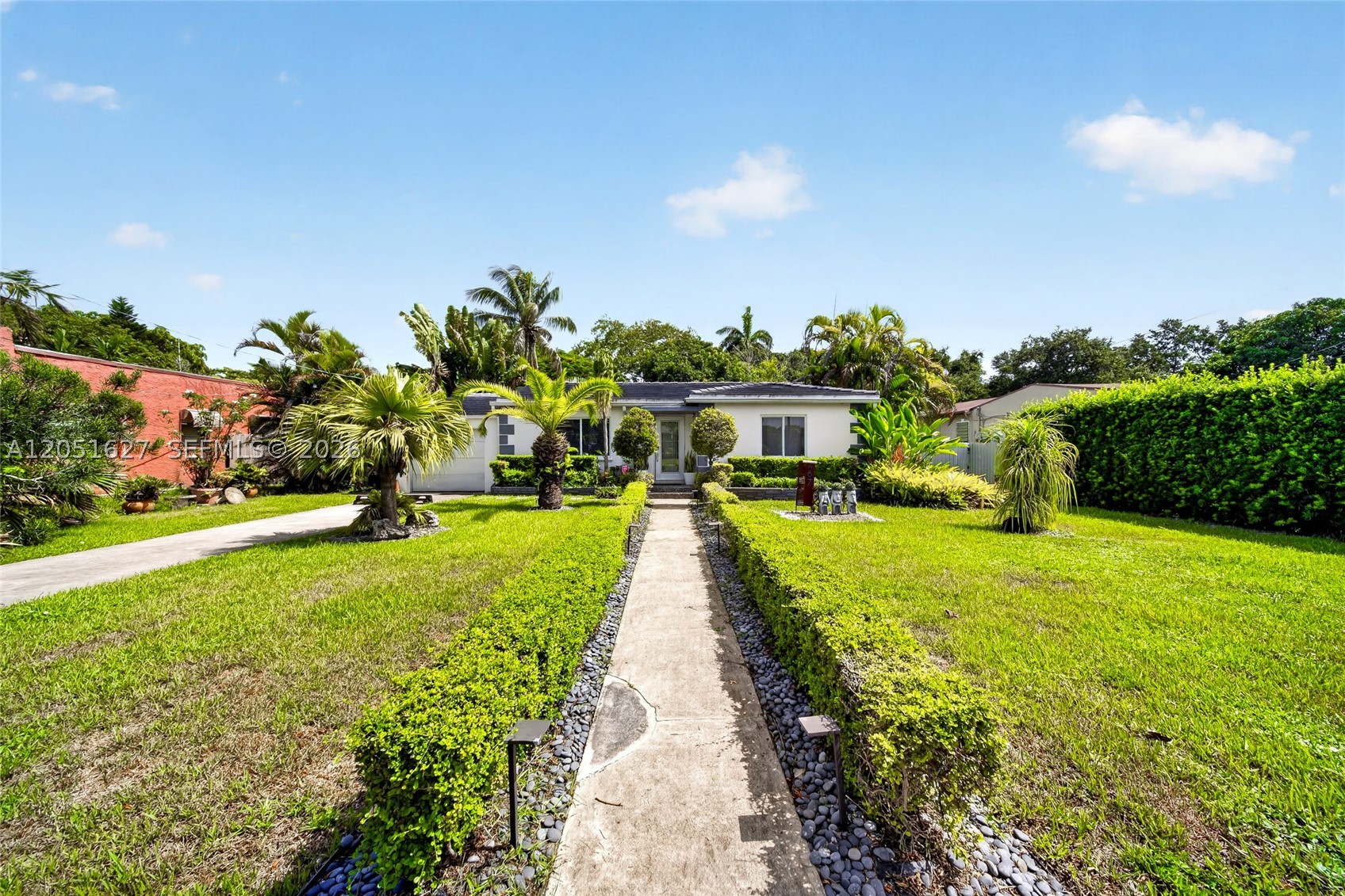 Exceptional Income-Producing Property with Endless Possibilities!
Don’t miss this rare opportunity to own a beautifully renovated property that perfectly combines luxury, lifestyle, and investment potential. Nestled on an oversized, professionally landscaped lot with mature trees and lush tropical gardens, this unique offering includes a fully legal detached 1-bedroom, 1-bath guest house with a proven history of generating excellent annual Airbnb income.
The main residence has been tastefully renovated and features brand-new plumbing and high-impact windows throughout. The guest house also offers high-impact windows, providing comfort, energy efficiency, and peace of mind across the entire property.

The expansive grounds offer endless possibilities, with plenty of room to build a pool, expand the existing improvements, create an outdoor entertainment oasis, or design the backyard of your dreams. Whether you’re
looking for a primary residence with supplemental income, a multigenerational living arrangement, or an 
exceptional investment opportunity, this property checks every box
Move-in ready, income-producing, and loaded with future potential—this is truly a one-of-a-kind opportunity.Easy to show.


Easy to show. Contact the listing agent today for your private showing!