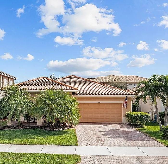 Beautiful 4 bedroom, 2 baths, 2 car garage home all on one level in the quiet subdivision of Martins Crossing.  Updated kitchen with stunning white quartz countertops and stainless steel appliances. Just minutes from Martin County's beautiful beaches and in the "A" rated Martin County school district. Martins Crossing is a desirable community featuring a community pool and clubhouse with a state of the art fitness center, tennis courts, and a fenced tot lot w/ lots of walking/biking areas. Close to I-95 and Turnpike for the commuter, with plentiful restaurants for the foodie and world class shopping close by.