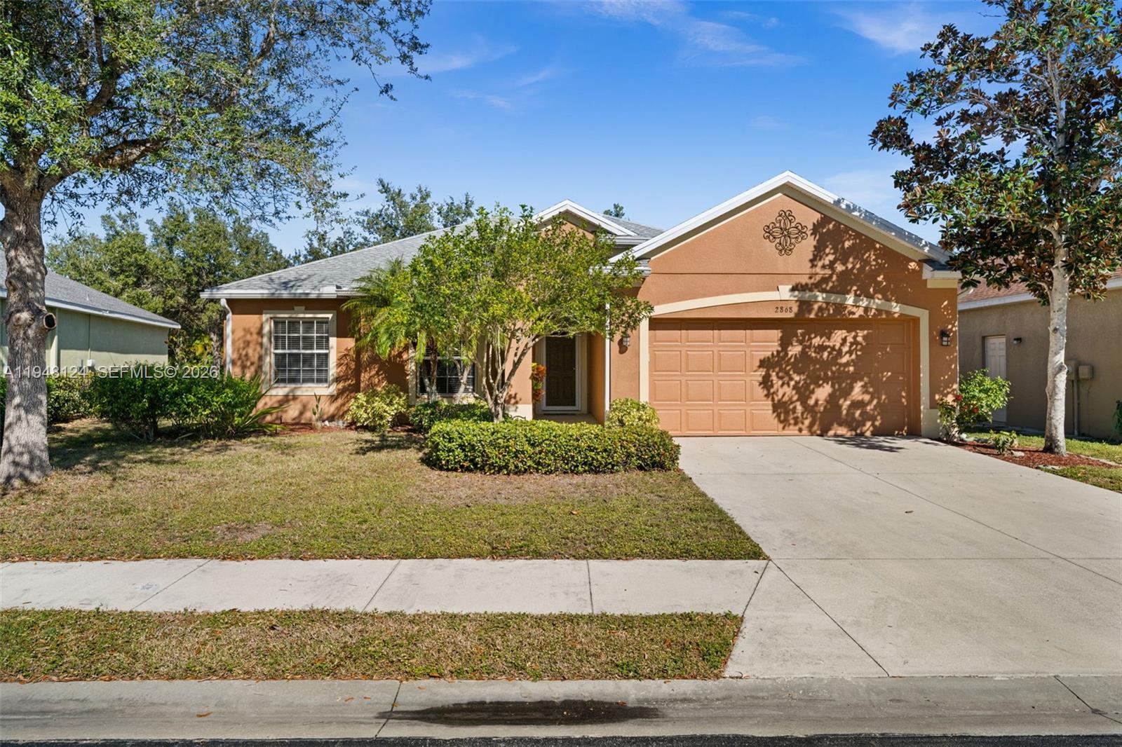 BEAUTIFUL WATER VIEWS! Welcome to 2868 Suncoast Lakes Blvd in Punta Gorda, located in the gated community of Suncoast Lakes. This well-maintained 2-bedroom, plus office, 2-bath home offers an open floor plan with peaceful pond views and comfortable indoor-outdoor living. The living room features a large sliding glass door that opens to the screened lanai, creating a bright and airy space that takes full advantage of the water view. The kitchen includes a breakfast bar, tile backsplash, and ample counter space, and opens to the adjacent dining area with pond views and direct access to the lanai. Just off the entry is a dedicated office with an arched window, ideal for working from home or a flexible space. The primary bedroom overlooks the pond and features a walk-in closet and an ensuite bath with dual sinks and a walk-in tiled shower. A split bedroom layout provides privacy for guests. Suncoast Lakes is a pet-friendly community offering a heated pool and park area, and is centrally located near shopping, schools, golf, downtown Punta Gorda, and Charlotte Harbor. Cable TV, internet, and irrigation water are included in the HOA fee. Best of all, this home is not located in a flood zone, making it an excellent full-time residence or seasonal retreat. NEW HVAC 2025, ROOF & GUTTERS 2022, WATER HEATER 2021, NEW APPLIANCES, NO FLOOD ZONE!