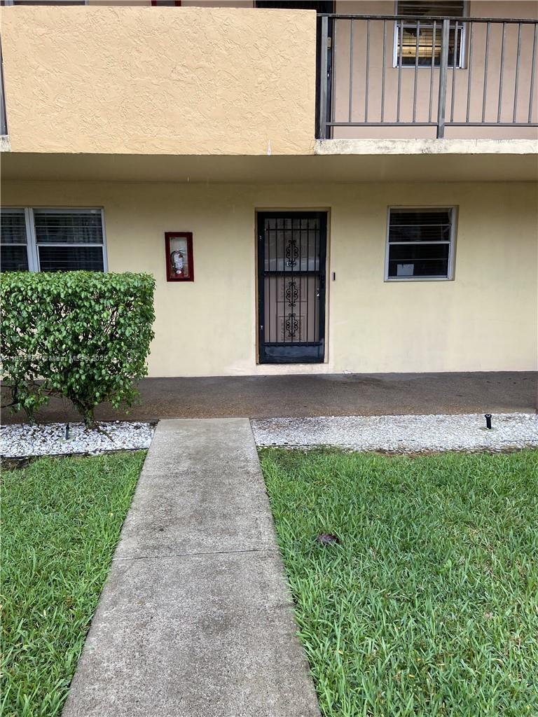 Beautifully updated ** 2BR + DEN ** ground-floor condo in Sunrise Island featuring a highly versatile den—currently used as a bedroom—perfect as a guest room, home office, or additional living area. The unit boasts a modern kitchen with granite countertops, tile backsplash, and stainless steel appliances, complemented by upgraded bathrooms and elegant tile flooring throughout. Enjoy peaceful views from the spacious screened patio that opens to lush green space. This well-maintained community offers a pool, tennis courts, clubhouse, laundry facilities, elevator, and assigned parking. Ideally located just minutes from Sawgrass Mills Mall, Nob Hill shopping and dining, Oak Hammock Park, and top-rated schools like Sandpiper Elementary. A rare combination of space, style, and convenience.