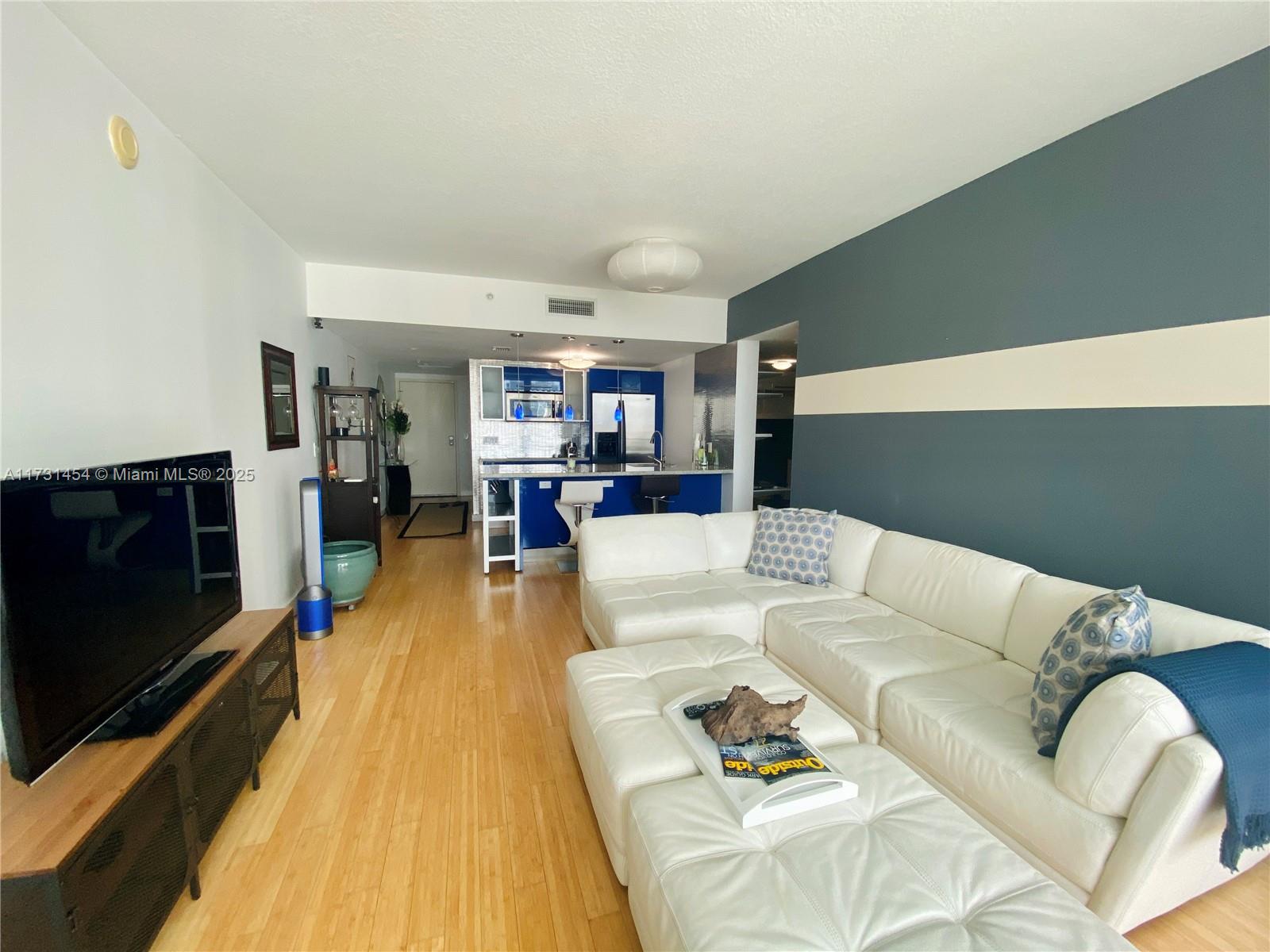 One bedroom one bath plus large den. The property boasts, August door locks, smart faucets, water purifiers, and a Bio-shield system on the HVAC unit that kills air contaminants! The rental includes basic cable, basic wifi internet, water and parking for one car with an electric charging station.  Tenant must be approved by the association. Showings are by appointment only. Good income and credit are a must. The balcony on this unit is open. The pool is still closed until further notice. 6 month rental at $3500