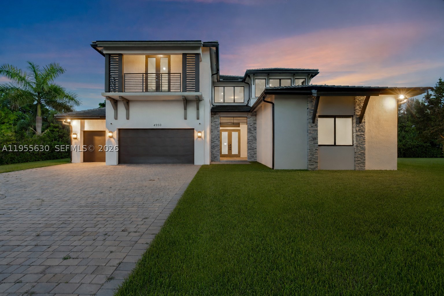 Welcome to this exceptional 2024 built modern estate featuring all the bells and whistles, located in the prestigious Circle S Estates, an exclusive private community of only 42 luxury residences. Situated on a one acre lot, this architectural masterpiece offers 6 bedrooms, 5 bathrooms, and a private in law quarters, delivering the perfect balance of sophistication, comfort, and privacy. Upon entry, you are welcomed by soaring volume ceilings, custom high end finishes, and an abundance of natural light throughout. The open concept design showcases expansive living areas ideal for both everyday living and elegant entertaining, making this home perfect for those who appreciate space and refined design. The chef inspired kitchen is a true showpiece, featuring sleek modern cabinetry, premium appliances, a spacious walk in pantry, and designer finishes that elevate both function and style. The oversized backyard offers endless potential to create your own resort style retreat, with ample room for a custom pool, summer kitchen, and outdoor entertainment areas, perfectly suited for the South Florida lifestyle.
Designed for discerning buyers who value luxury, space, and exclusivity, this residence presents a rare opportunity to own in one of the area’s most desirable communities. Schedule your private showing today and experience elevated living at its finest. Seller is willing to offer a pool credit with a full-price offer.