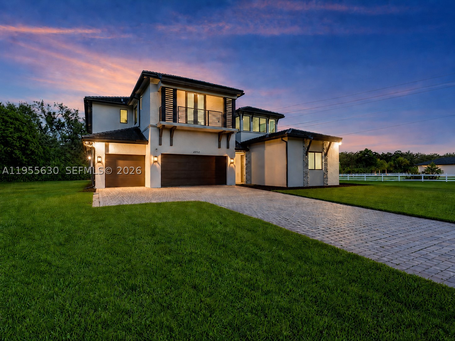 Welcome to this exceptional 2024 built modern estate featuring all the bells and whistles, located in the prestigious Circle S Estates, an exclusive private community of only 42 luxury residences. Situated on a one acre lot, this architectural masterpiece offers 6 bedrooms, 5 bathrooms, and a private in law quarters, delivering the perfect balance of sophistication, comfort, and privacy. Upon entry, you are welcomed by soaring volume ceilings, custom high end finishes, and an abundance of natural light throughout. The open concept design showcases expansive living areas ideal for both everyday living and elegant entertaining, making this home perfect for those who appreciate space and refined design. The chef inspired kitchen is a true showpiece, featuring sleek modern cabinetry, premium appliances, a spacious walk in pantry, and designer finishes that elevate both function and style. The oversized backyard offers endless potential to create your own resort style retreat, with ample room for a custom pool, summer kitchen, and outdoor entertainment areas, perfectly suited for the South Florida lifestyle.
Designed for discerning buyers who value luxury, space, and exclusivity, this residence presents a rare opportunity to own in one of the area’s most desirable communities. Schedule your private showing today and experience elevated living at its finest. Seller is willing to offer a pool credit with a full-price offer.