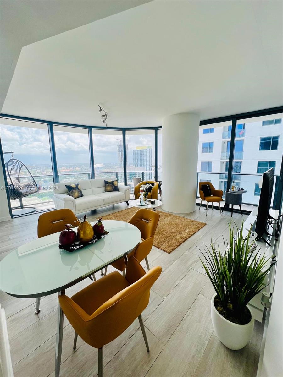Fabulous 2-bedroom, 2 bathroom unit, with open kitchen with European-style cabinetry and stainless-steel appliances. Floor to ceiling high impact glass windows and wrap-around balcony. Maintenance included basic internet and cable. Brickell Heights is Located in the middle of Brickell City Center and Mary Brickell Village, Designed by Arquitectonica. Amenities include a rooftop pool and a 9th floor swimming pool with terrace, business center, private areas for specials events, kid's club, 24 hour concierges at front desk and valet parking.