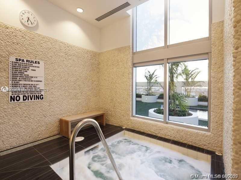 MINT CONDOMINIUM - Residential Lease