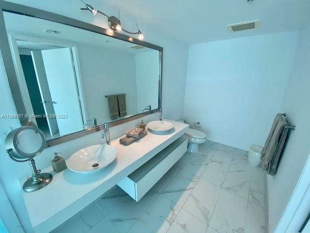 MINT CONDOMINIUM - Residential Lease