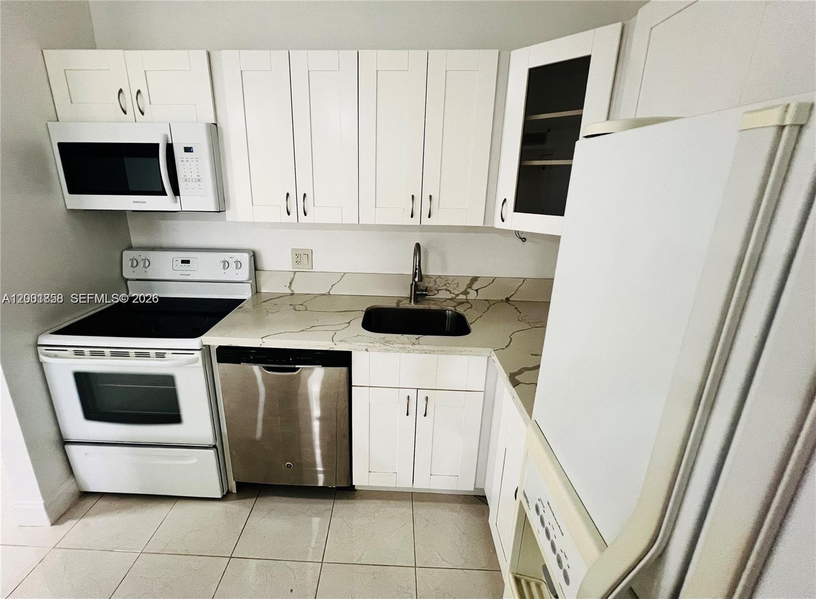 TAMARAC GARDENS CONDOMINI - Residential
