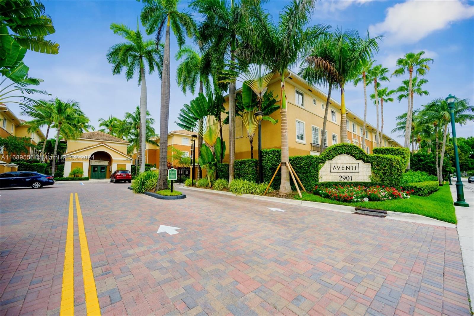 Townhome condo - rare in Miami! Two parking spaces, one of them covered. Excellent property in private and welcoming community. No elevators or front desks! AAA location near the Aventura Mall, Sunny Isles, schools, main roads, and the beach. Call Today. E-Z to show
