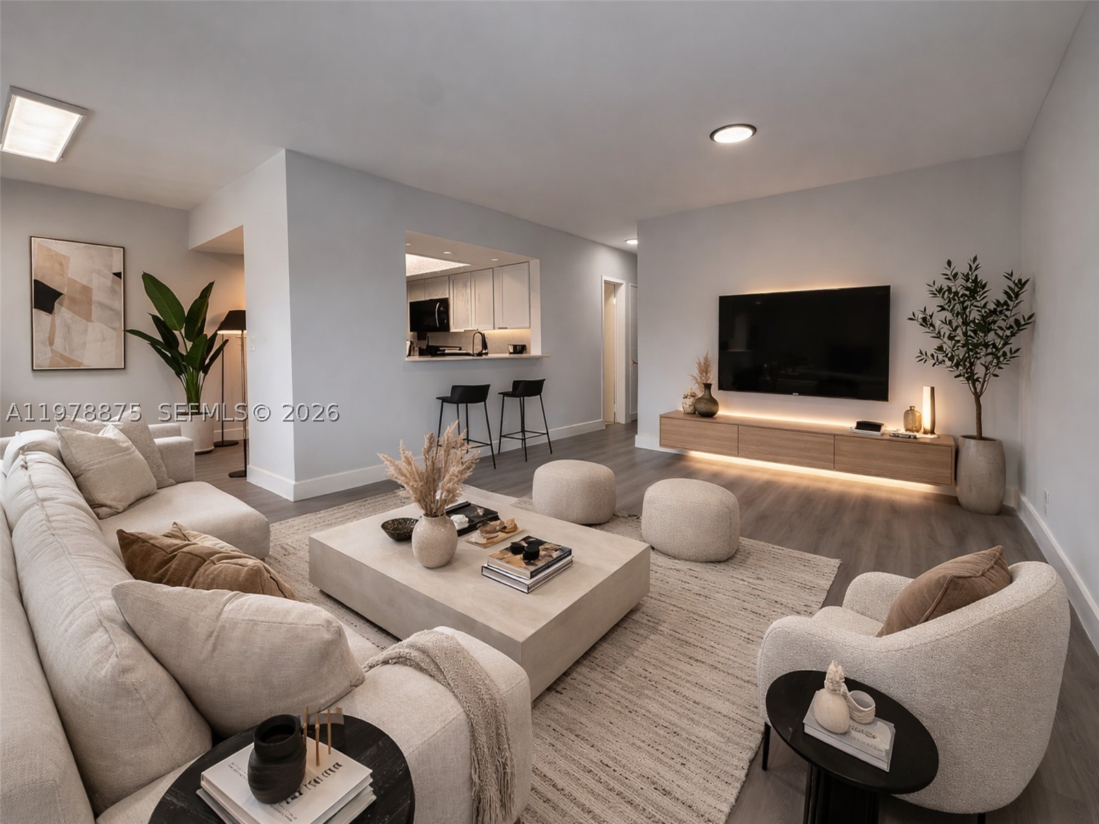 Seller financing may be available. Fully renovated 2-bed/1-bath condo with  870 sq ft of living space and a well-designed layout.

The unit features a modern kitchen and impact windows and doors. Move-in ready condition with updates that allow the next owner to enjoy the property with minimal maintenance for years to come.

Investor-friendly opportunity with the ability to rent immediately. 

The unit includes assigned parking and offers stunning views of the pool and garden. The community features a pool, barbecue area, and spacious waterfront garden with waterfront seating areas, providing pleasant outdoor spaces overlooking the water.

Located in a prime Hallandale Beach location, within walking distance to the beach, as well as cafes, restaurants, supermarkets, fitness centers, and shopping, providing convenient access to everyday services and the beach area.