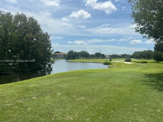 Davie Golf at your Backyard! Close to NOVA University, Florida University Hospital, Davie Shopping Center. few blocks from I-595 and S University Dr. Bright living room, 2 spacious Bedrooms with walk-in closet, 2 bathrooms, principal with Jacuzzi, private balcony with open view to the Golf Court, A/C replaced in 2021, Arrowhead's amenities includes swimming pool, clubhouse, tennis court, BBQ. Rented till 12/01/2026 at $ 2,050. SPECIAL ASSESSMENTS: USD 72 TILL 2029 AND USD 314 TILL 2036. 
FOR MORE INFO PLS CONTACT HOA.