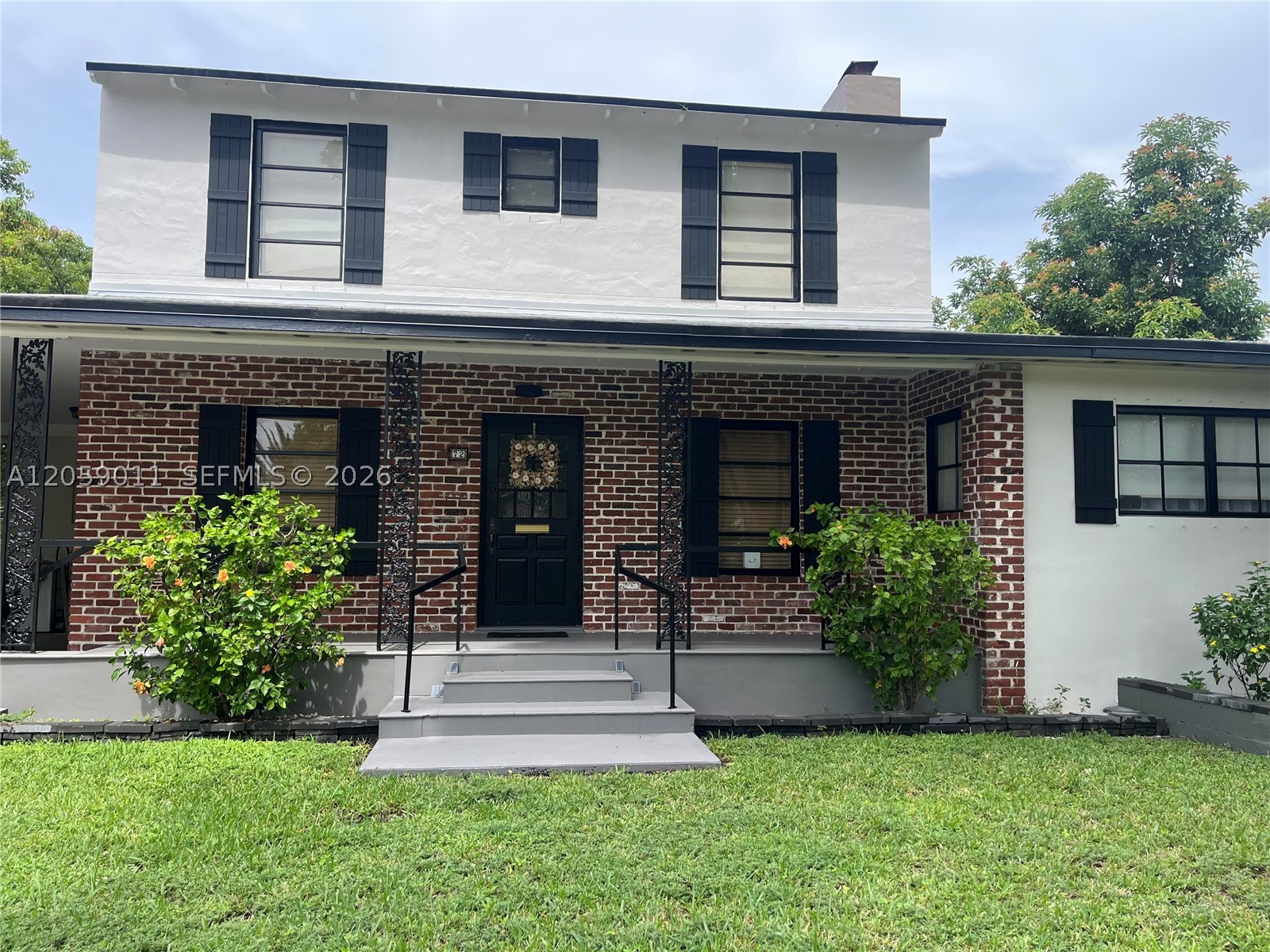 Desirable Palmetto Drive.  This LARGE LOT is less than  a block from 'the circle'.  Unique original 2 story with a 'wrap around addition.  EXTRA Structures / ROOMS:  extended covered parking, concrete room pending conversion to 3rd Bathroom (sewer pipe close) with Laundry,  2 CAR GARAGE alley access pending conversion to GUEST HOUSE, mostly remolded with working floor to ceiling FIREPLACE. , LARGE  master bedroom Also with backyard access /door. (potential Rental).   Tile 24x48 matt tile and LIGHT oak floors, seamless Quartz,  fluted porcelain farm sink, Bespoke STOVE and Glass front Refrigerator. Farmhouse doors,  Uniform l window shades. New valves / hook up for washer. Butterfly & Bea Trees, Mango too. Access to Gas line. Brand new roof on Garage. #A12023418  not easy to contact m e