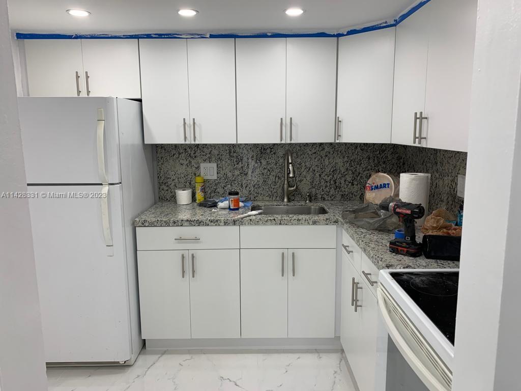 SPACIOUS 2 BEDROOMS 2 BATHROOMS APARTMENT ON THE FIRST FLOOR WITH SMALL ENCLOSED PATIO IN CAPTIVA LAKES. UNIT HAS BEEN COMPLETELY REMODELED RECENTLY. THE BUILDING HAS NEW ROOF AND IS IN PROCESS OF BEING PAINTED. There is a lien on the association but, seller obtained a partial release of the unit from the lien. Prospective Buyer will have to sign a hold harmless. CASH OFFERS ONLY.