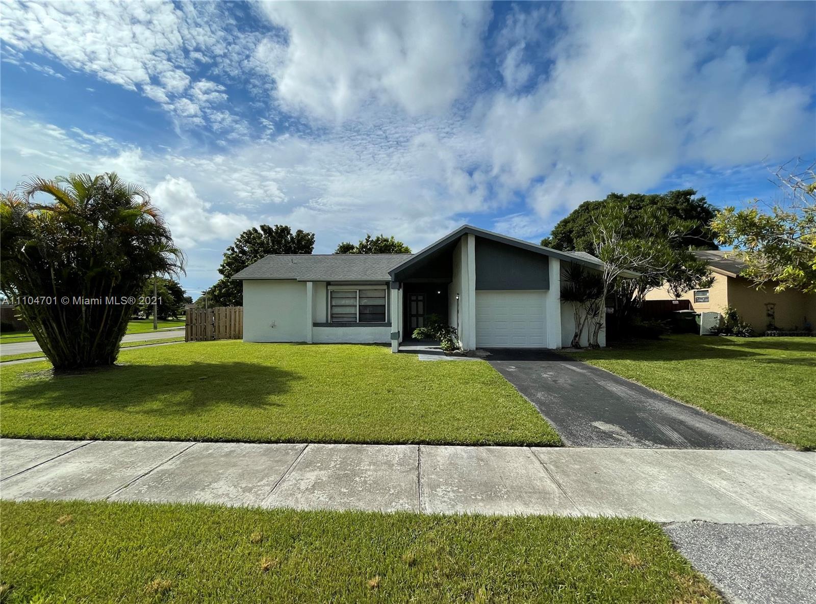Charming  3/2  home in Audubon Villages of Homestead.  Corner lot property features a large fenced-in yard, fruit trees,1-car garage, new roof, and new tankless water heater. Audubon community offers a community pool, gym, tennis courts, and children's play area with low association fees.