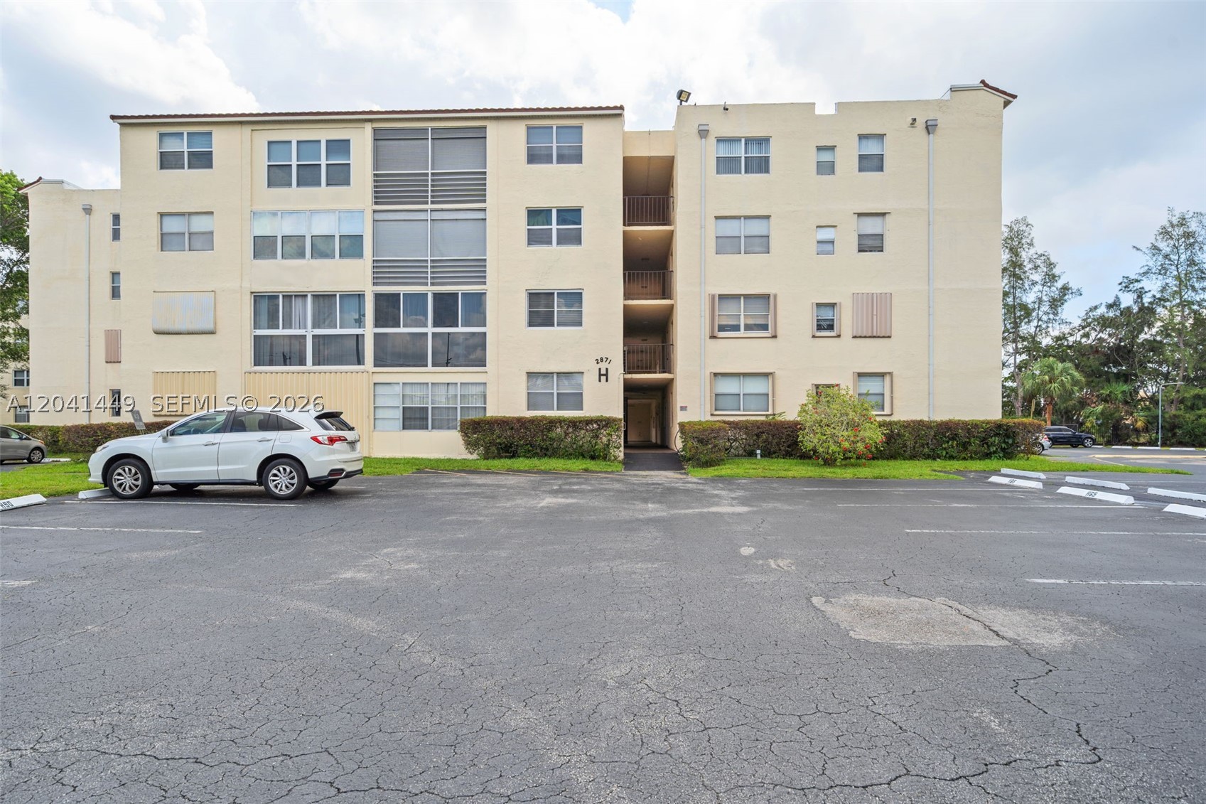Welcome to this beautifully maintained 2-bedroom, 2-bath corner unit in the desirable Somerset 55+ community of Lauderdale Lakes. This first-floor residence offers 1,010 square feet of comfortable living space with a bright, open layout, split-bedroom floor plan, abundant natural light, and spacious walk-in closets.

Enjoy a private balcony overlooking the beautifully maintained community grounds. The unit features laminate and tile flooring, central air conditioning, and is move-in ready or ready for your personal updates.

Somerset is a gated, well-maintained community offering resort-style amenities including a clubhouse, fitness center, swimming pool, tennis courts, pickleball, common laundry facilities, elevators, and 24-hour security patrol. The monthly association fee includes water, sewer, trash, exterior maintenance, roof, insurance, pest control, reserves, and more.

Conveniently located near shopping, dining, medical facilities, parks, major highways, and Fort Lauderdale beaches. Association approval required. No leasing permitted. Don't miss this opportunity to own an affordable home in one of Lauderdale Lakes' most established active adult communities.