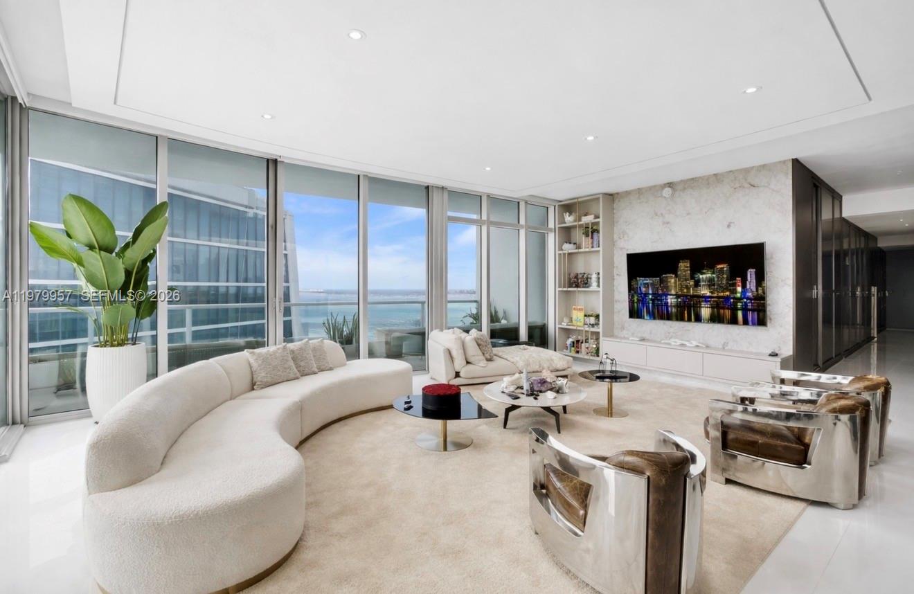 This stunning remodeled with luxury finishes PENTHOUSE offers a very spacious 2815 sqft of living area + 759 sqft of terraces totalizing 3,574 sqft. It welcomes you with exquisite & spacious rooms, elegant and welcoming ambients. Top of the line appliances. Wood panels, wall paper and Cristallo quartz Lux enhancing the walls. Sunset/city view and bay view, high ceilings & panoramic impact windows/doors, private balcony in each bedroom, in each bathroom and in the living room. 
900 Biscayne Bay offers hotel-style amenities including full-service spa, fitness center, pools, activity room, movie theater, children’s playroom, library & more. 
The building was completely remodeled externally and internally offering confort and beautiful common areas. The City of Miami is transforming Downtown Miami into the Epicenter of the Americas. Increasing the livability, connecting and maximizing the Central Business District, Arts & Entertainment in Miami’s celebrated waterfront making this property a safe investment. The building allows renting for 30 days minimum making this property a great opportunity for investors too. No Assessment in place or for near future. Amazing investment. Motivated seller.