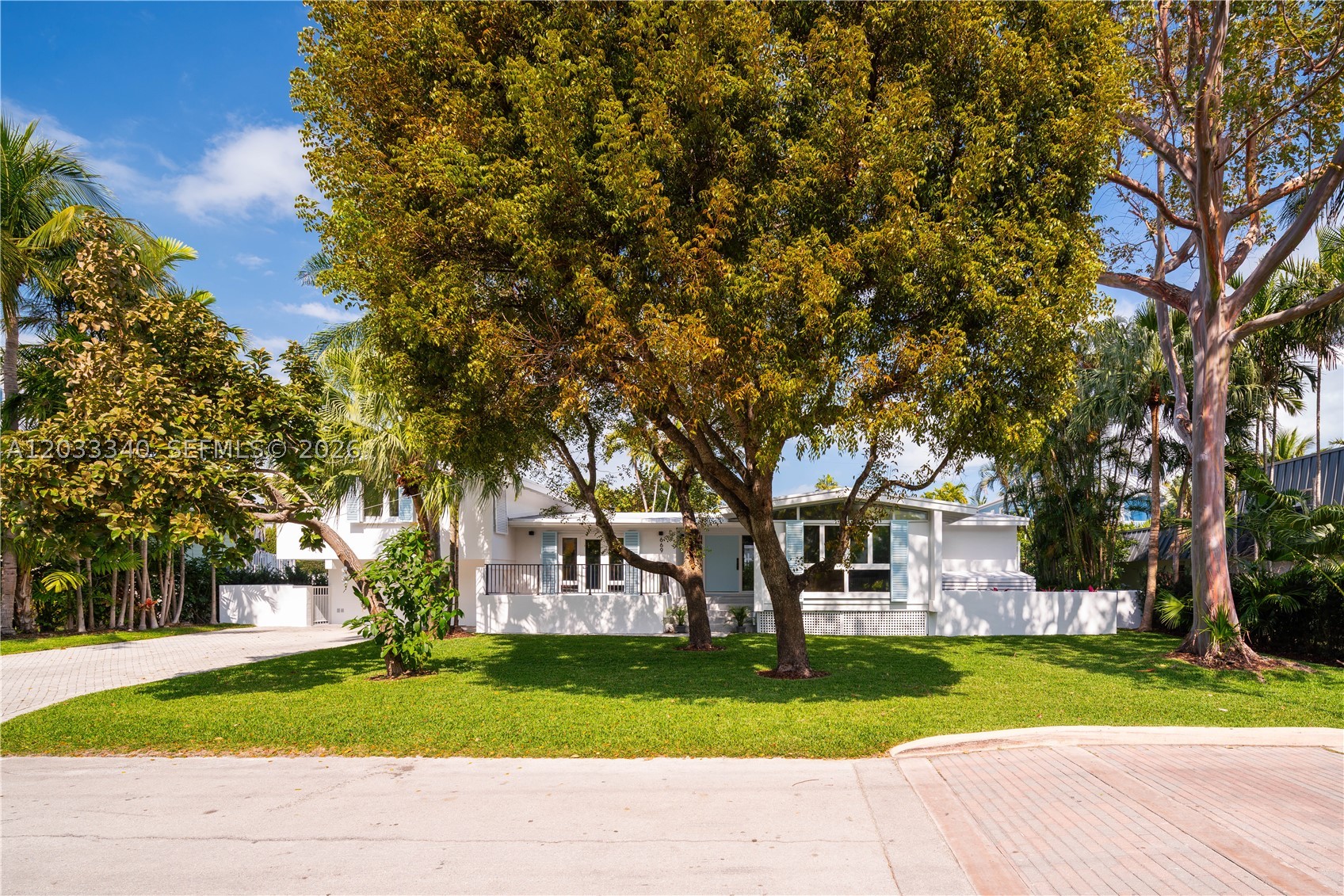 Located on the exclusive and highly sought-after Mashta Island, this exceptional property offers a rare opportunity to build your dream home or enjoy the existing beautifully refurbished residence. The home features new bathrooms, updated flooring, and tasteful modern finishes throughout. Designed for relaxed Florida living, the spacious covered terrace overlooks a stunning mosaic-tiled pool, creating the perfect setting for entertaining or enjoying the tropical surroundings. A unique opportunity in one of Key Biscayne's most desirable neighborhoods. Easy to show.
