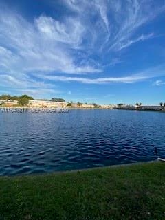 Beautiful CORNER unit with 1 bedroom and 1 bathroom in a great lakefront location within Rolen Lake. Walk the lakefront path to the clubhouse and pool area. Bright and inviting, this home features peaceful lake views directly from the bedroom and lakefront patio right outside the back door. This unit features an updated bathroom, new water heater, a huge pantry providing lots of storage, and a great floor plan. Impact windows with new blinds and a mini-split A/C in the living area. Conveniently located next to the laundry/utility room. This Community is well-maintained, HOPA-verified community offering resort-style amenities such as a sparkling lakefront pool,
BBQ area, shuffleboard, billiards, fitness center, and community room. Conveniently close to beaches, shopping, dining, and major highways.