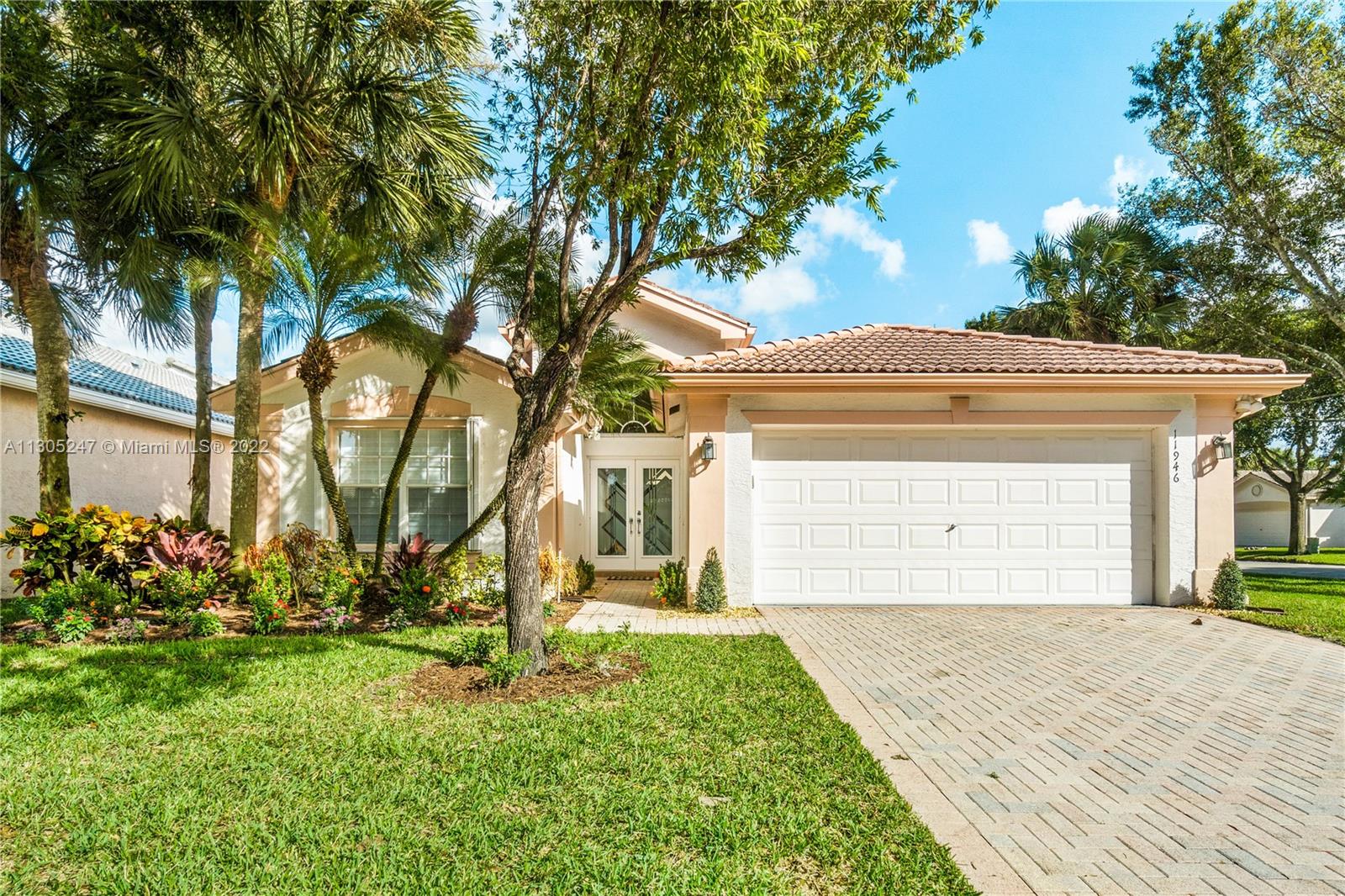 Located on a charming street inside the inviting Gated Community of Valencia Lakes, this beautifully renovated home sits on a large, serene corner lot. With an opened up floor plan, this bright and white layout is a homeowners dream. Featuring imported marble kitchen countertops, brand new cabinetry, and brand new top-of-the-line Samsung appliances, this kitchen has been updated to perfection. New lighting fixtures are in place throughout the house, along with 36 x 36 Porcelain Tile, motorized blinds, and beautifully etched doors. New inviting landscaping surrounds the house to perfectly complement the new alluring interior. Enjoy everything this modernized home and Valencia Lakes has to offer!