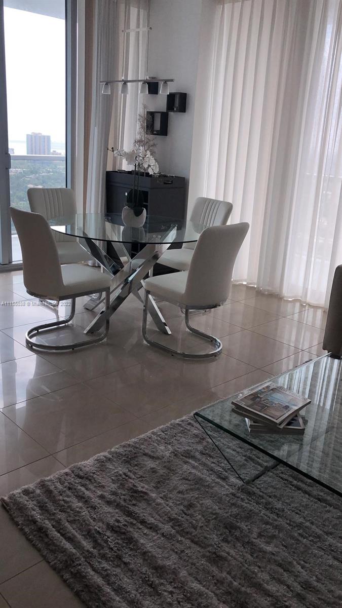 THE AXIS ON BRICKELL COND - Residential Lease