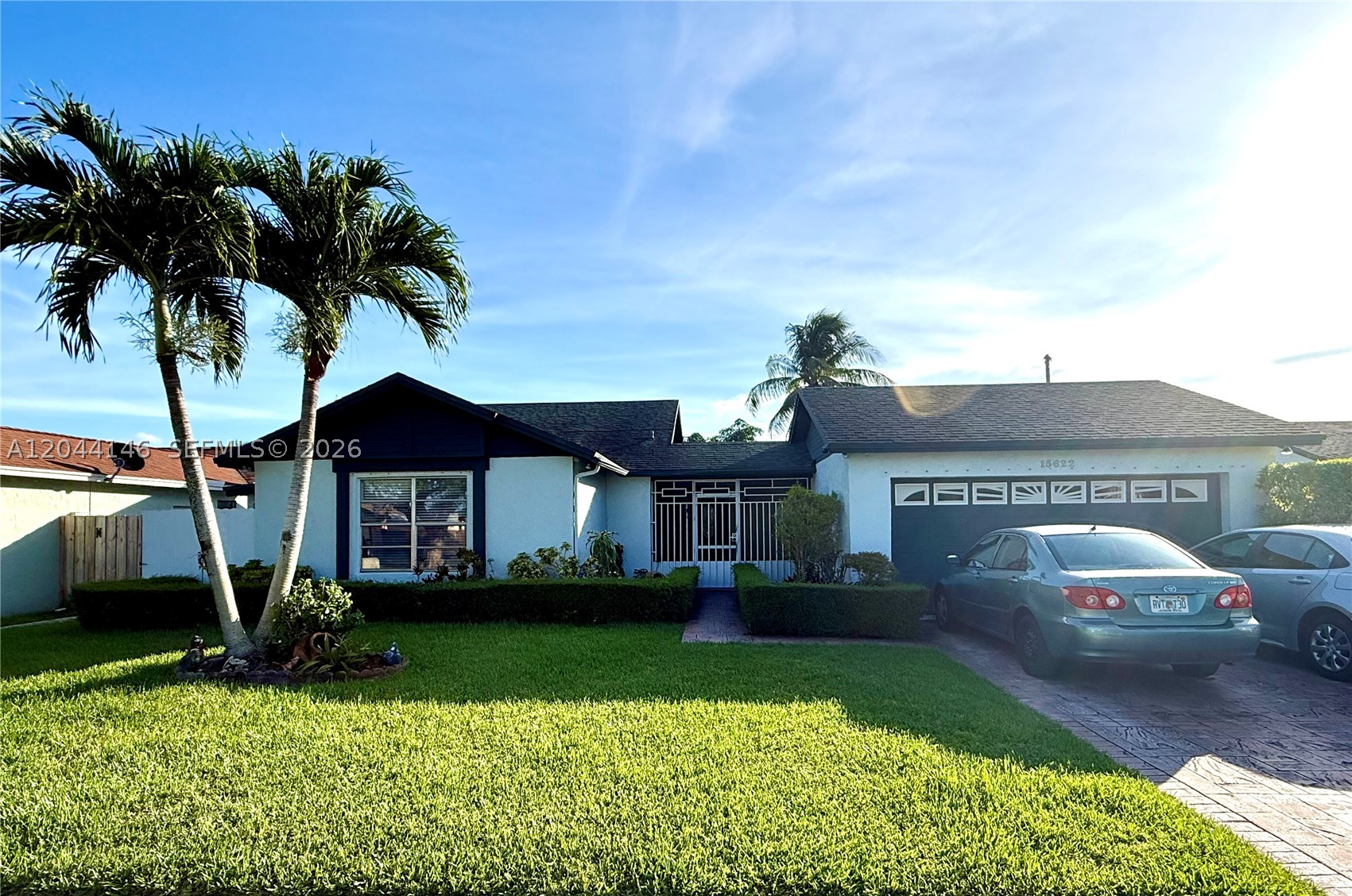 Beautifully maintained 4 bedroom, 2 bath canal front home on an oversized lot! This move-in ready gem features traditional appliances, spacious living areas, tile floors, impeccable landscaping, solar panels and a private backyard oasis with serene canal views! Perfect for entertaining or just relaxing! 
Located in a family friendly neighborhood within walking distance of Jack Gordon Elementary's PLC. Don't miss this exceptional opportunity to call this wonderful place home!!  
The converted garages been transformed into a versatile efficiency- ideal for extended family, guests, or as an income producing opportunity !