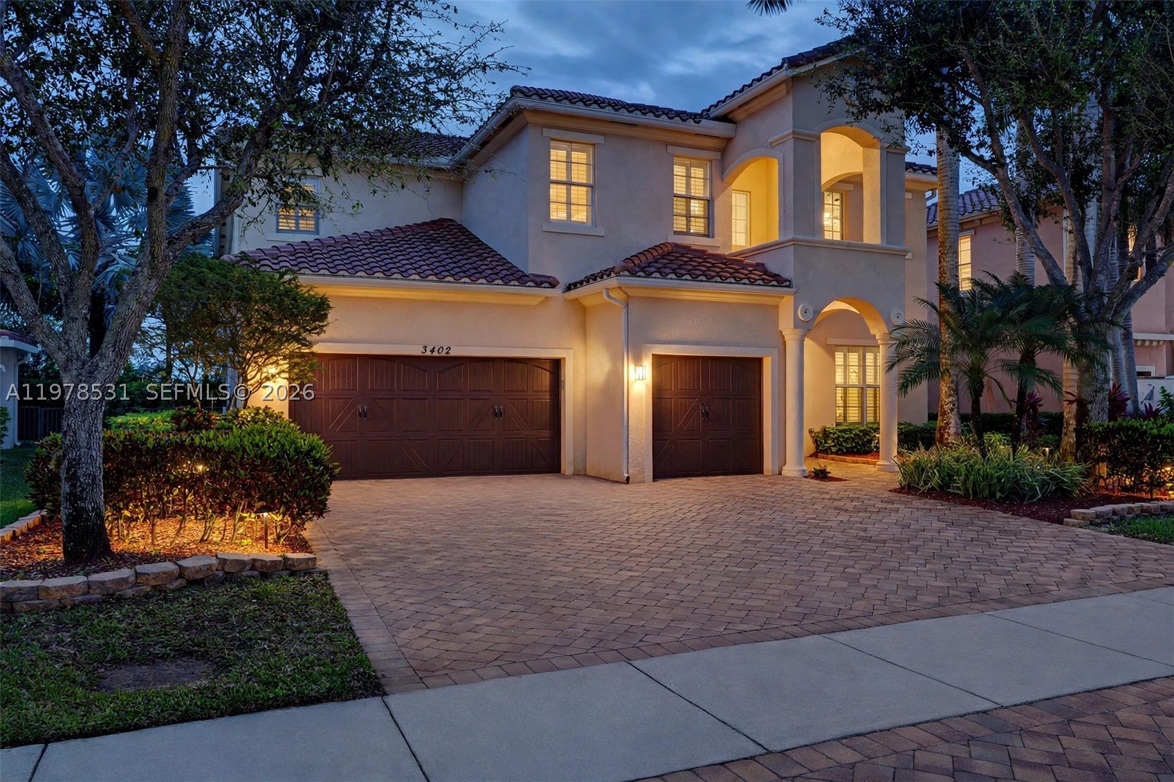 Experience one of Oakmont Estates' most desirable and functional floor plans! This beautifully maintained 6-bedroom, 5.5-bath home offers over 4,100 square feet of thoughtfully designed living space, including a first-floor guest suite with a full bath—ideal for multigenerational living, guests, or a private home office.

The open-concept layout is perfect for everyday living and entertaining, featuring a spacious chef's kitchen with double ovens, wine refrigerator, abundant cabinetry, and seamless flow into the family room. Upstairs, the oversized primary suite boasts a custom California Closet and a luxurious ensuite bath.

Enjoy your own private backyard retreat with a sparkling pool, spa, and a low-maintenance outdoor living space designed for relaxing and entertaining. A built-in mosquito misting system adds year-round comfort, while the 3-car garage provides ample storage.

Located in the gated community of Oakmont Estates, just minutes from A-rated Panther Run Elementary, world-renowned equestrian venues, shopping, dining, parks, and major roadways. Ideally situated near Wellington's planned Village Landing, this exceptional home offers the rare combination of space, functionality, and a location positioned for the community's continued evolution. Combining exceptional space, flexibility, and move-in-ready comfort, this home is a rare opportunity to own one of the community's largest and most versatile floor plans.