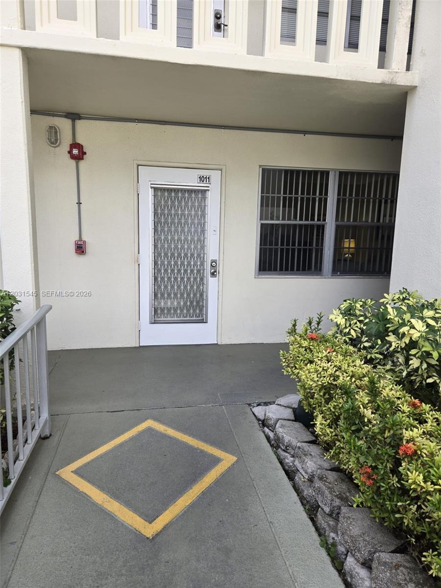 Welcome to this spacious 1 bed, 1.5 bath condo in South Florida's premier 55+ community - Century Village at Deerfield Beach! Ideally situated on the 1st floor. Beautifully maintained, close walk to the pool. Enjoy the convenience of your assigned parking space right next to the unit. Fully furnished and ready for immediate occupancy. Condo has been upgraded with porcelains floors, a walk in shower, mirror closet sliding doors, mirror pantry doors-- jalousie windows and French patio doors that lead to an enclosed patio area that is now a Den.  An active adult community with resort-style amenities at the Clubhouse, transportation, and social activities. Shuttle bus service in the village and to local markets and attractions. Prime location for comfortable Florida living! Easy to show!