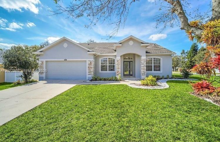 4 BEDROOM, 2 BATH SINGLE-FAMILY HOME. OFFERS A BRIGHT OPEN-CONCEPT LAYOUT FEATURING A BEAUTIFULLY REMODELED KITCHEN, CERAMIC TILE FLOORING THROUGHOUT THE MAIN LIVING AREAS, AND CARPET IN THE BEDROOMS FOR ADDED COMFORT. STEP OUTSIDE TO A GENEROUSLY SIZED BACKYARD WITH PLENTY OF SPACE TO BUILD YOUR DREAM POOL, CREATING THE PERFECT PRIVATE OASIS FOR ENTERTAINING AND RELAXING. THE SCREENED-IN PATIO IS IDEAL FOR ENJOYING BREAKFAST OUTDOORS, AND THE CHARMING FIREPLACE PROVIDES A COZY SETTING TO UNWIND WHILE ENJOYING FLORIDA SUNSETS. NEW ROOF (2023) — OFFERING PEACE OF MIND AND LONG-TERM VALUE. LOCATED IN A SECURE COMMUNITY WITH ACCESS TO A COMMUNITY POOL AND SITUATED IN ONE OF THE BEST AREAS, CLOSE TO TOP-RATED A+ SCHOOLS, SHOPPING, DINING, AND MAJOR HIGHWAYS. IT NOT ONLY A BEAUTIFUL HOME BUT ALSO A SMART INVESTMENT. THIS PROPERTY WILL NOT LAST — SCHEDULE YOUR PRIVATE SHOWING TODAY!