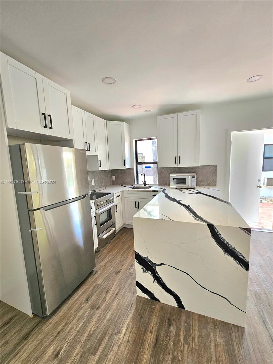 AVAILABLE! Fully renovated property near Downtown Hollywood! Fully renovated inside and out, including new windows, plumbing, and electrical systems. Each unit offers pristine kitchens with stainless steel appliances, quartz countertops, and stylishly reimagined bathrooms. Enjoy this amazing new property! Spacious 1-bed/1-bath unit! Close to major bus routes, downtown Hollywood, I-95, and beaches. Our 1-bed units are a massive 520sf +/- with a living/dining area, kitchen, bathroom, and cozy bedroom. It has a new AC and is stylishly designed inside and out! Contact us now to save your spot! Limited onsite parking; sign a lease now, and the landlord will pay for your 1st year parking permit!  *BACKGROUND CHECK ONLY - No credit check* Ask about MOVE-IN INCENTIVES!